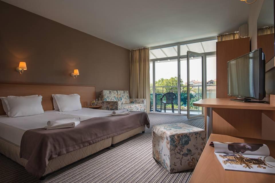 Deluxe Double Room with Pool View (2 Adults + 2 Children)
