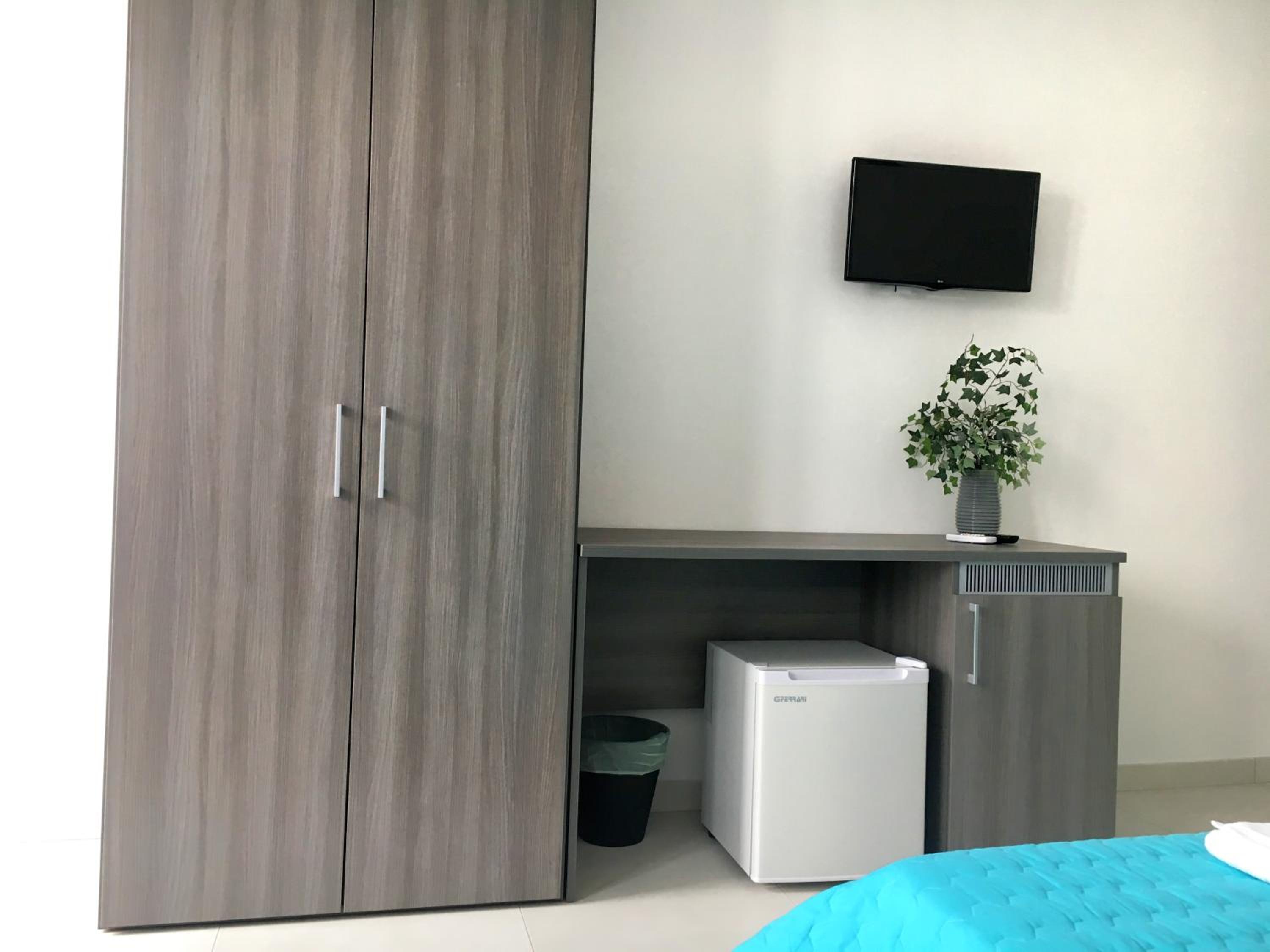 Deluxe Triple Room - Photo 10