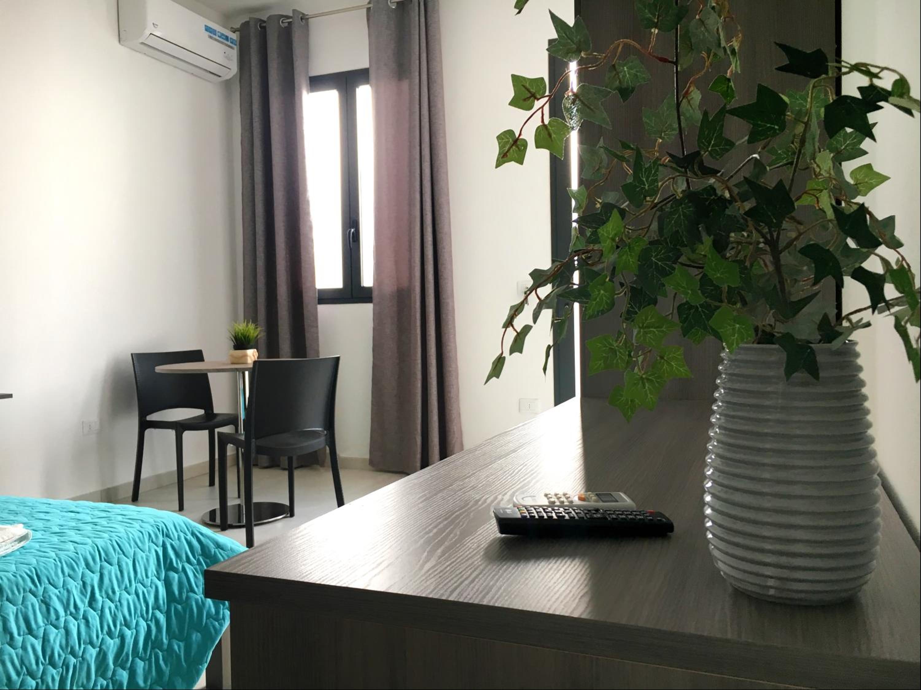 Deluxe Triple Room - Photo 29