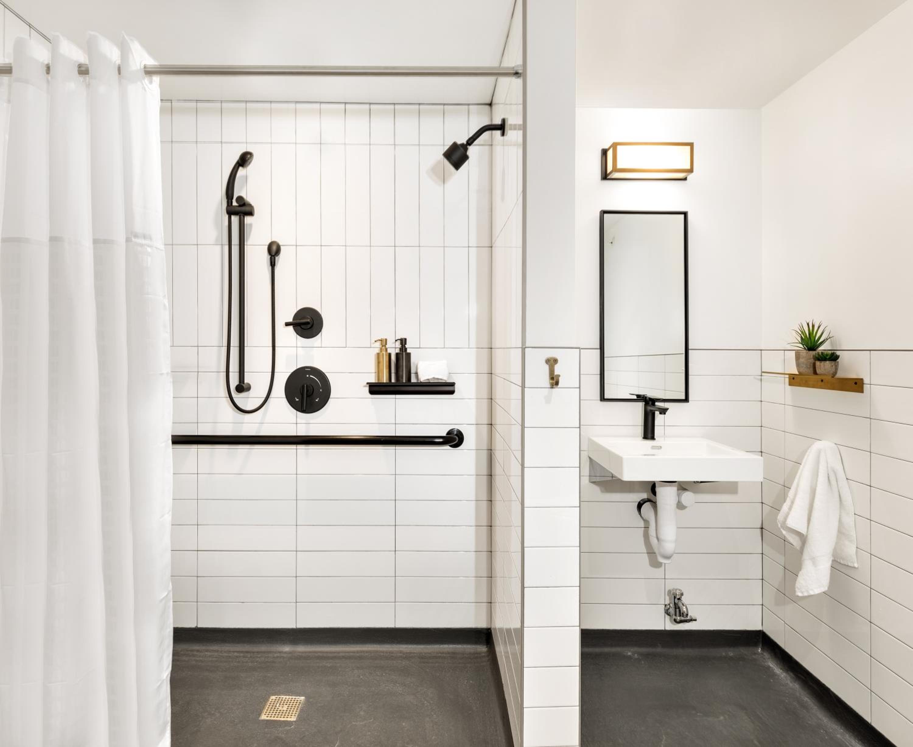 Accessible Queen Room Bathroom Down the Hall - Photo 8