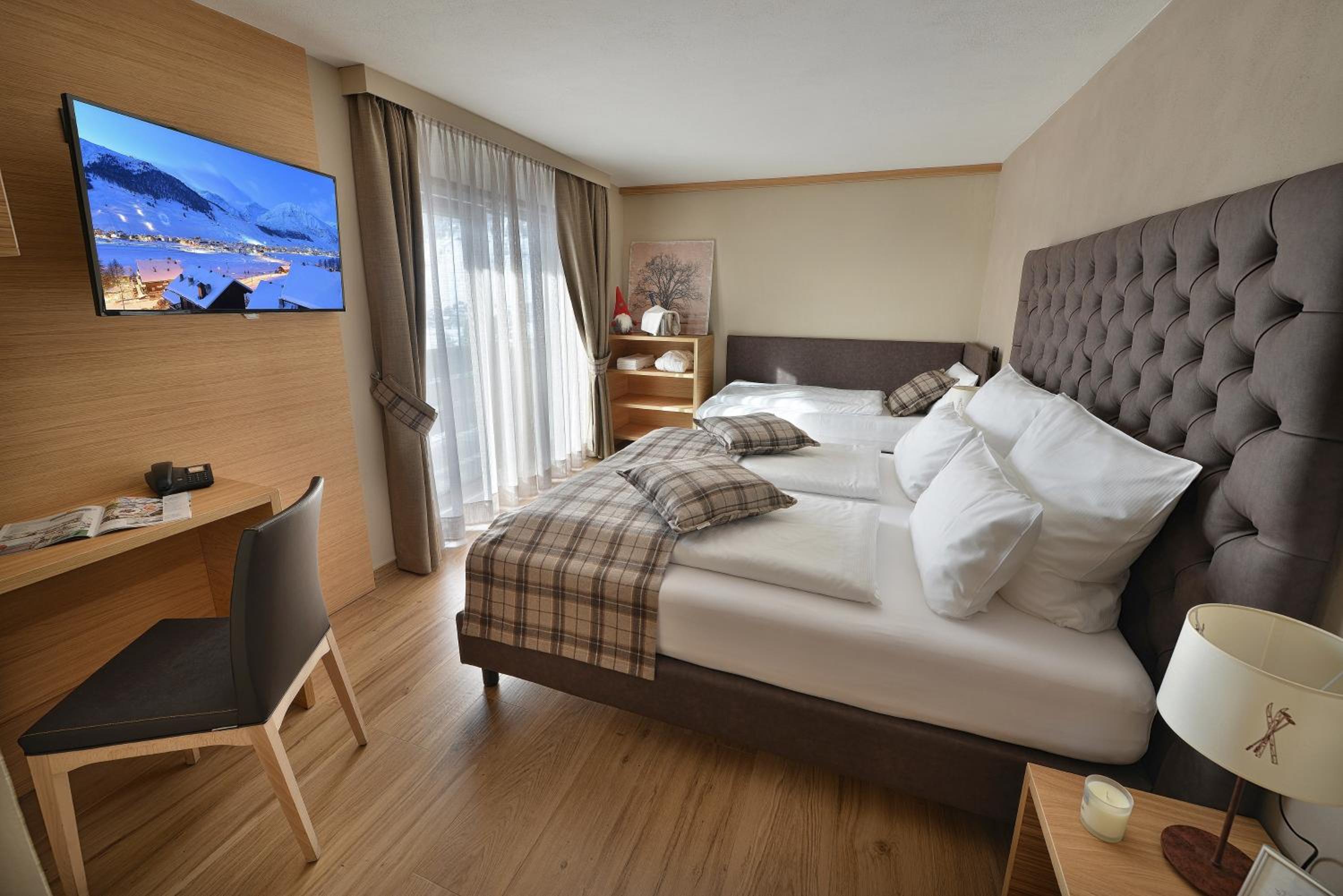 Deluxe Triple Room - Photo 6