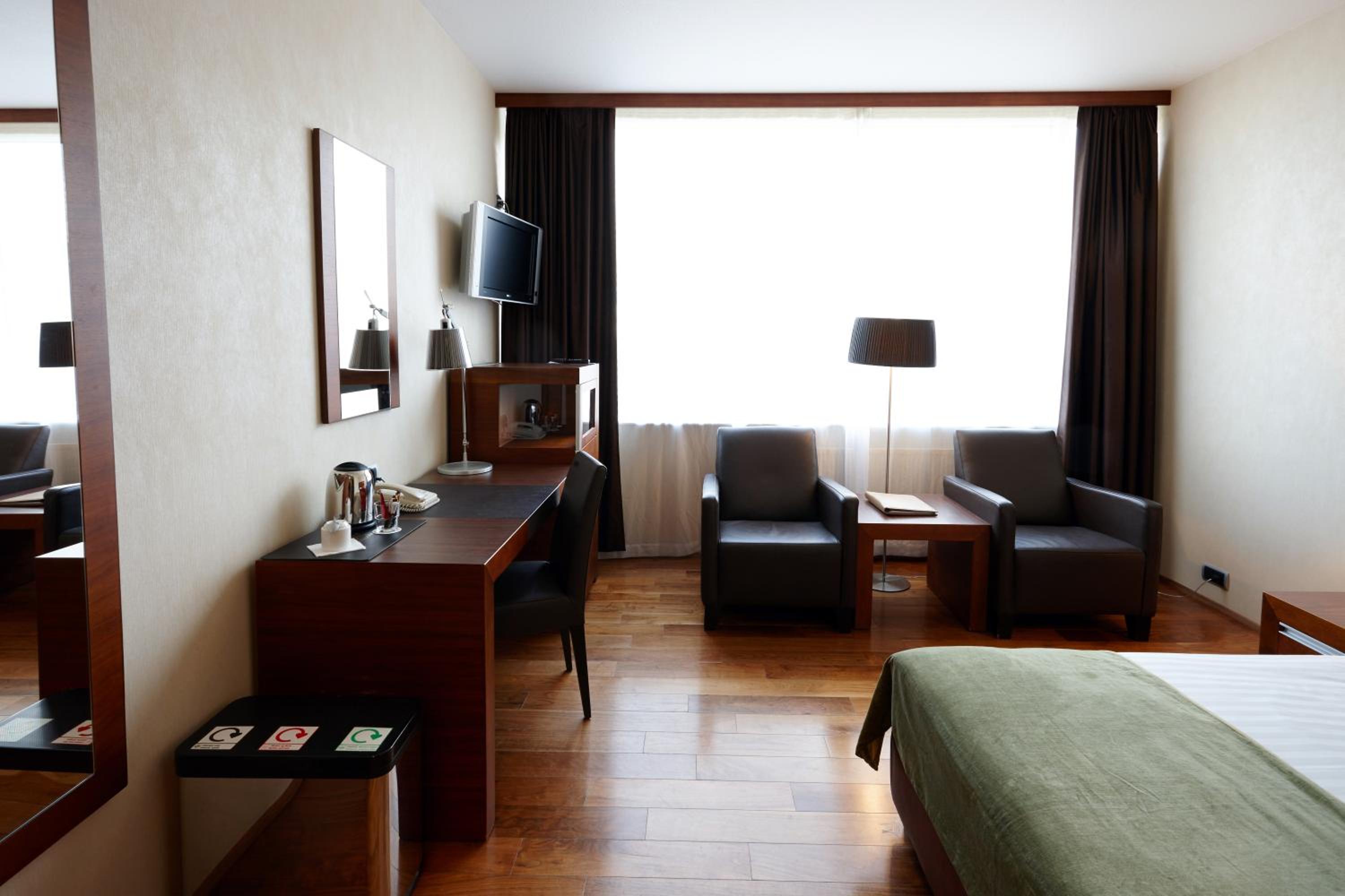 Experience comfort in our stylish hotel room!