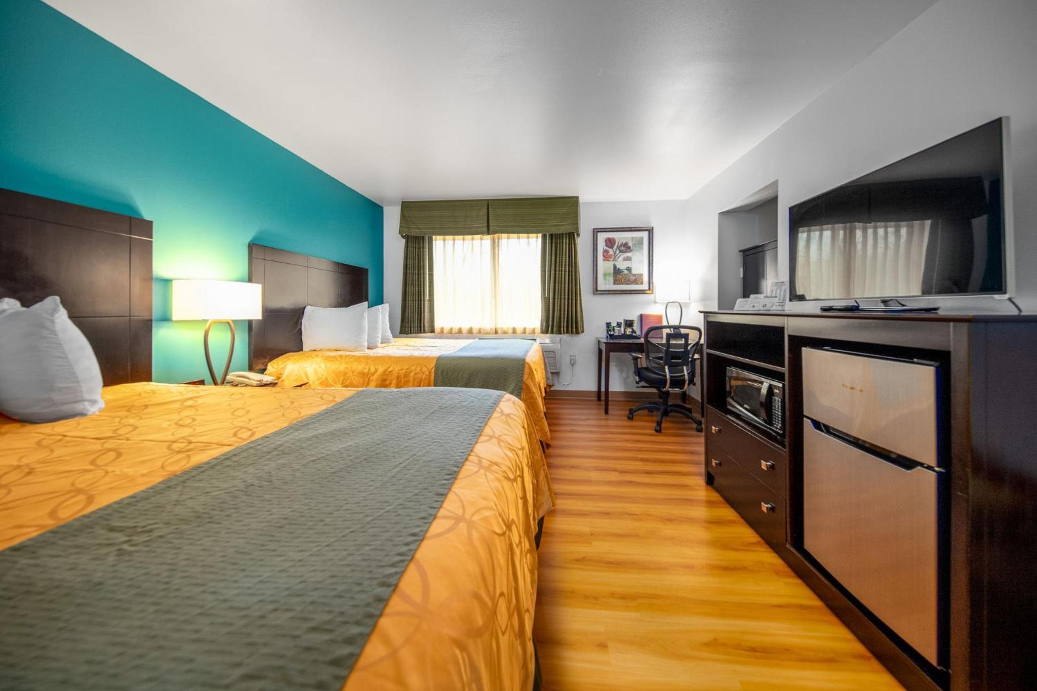 Queen Room with Two Queen Beds - Not Pet Friendly - Photo 1