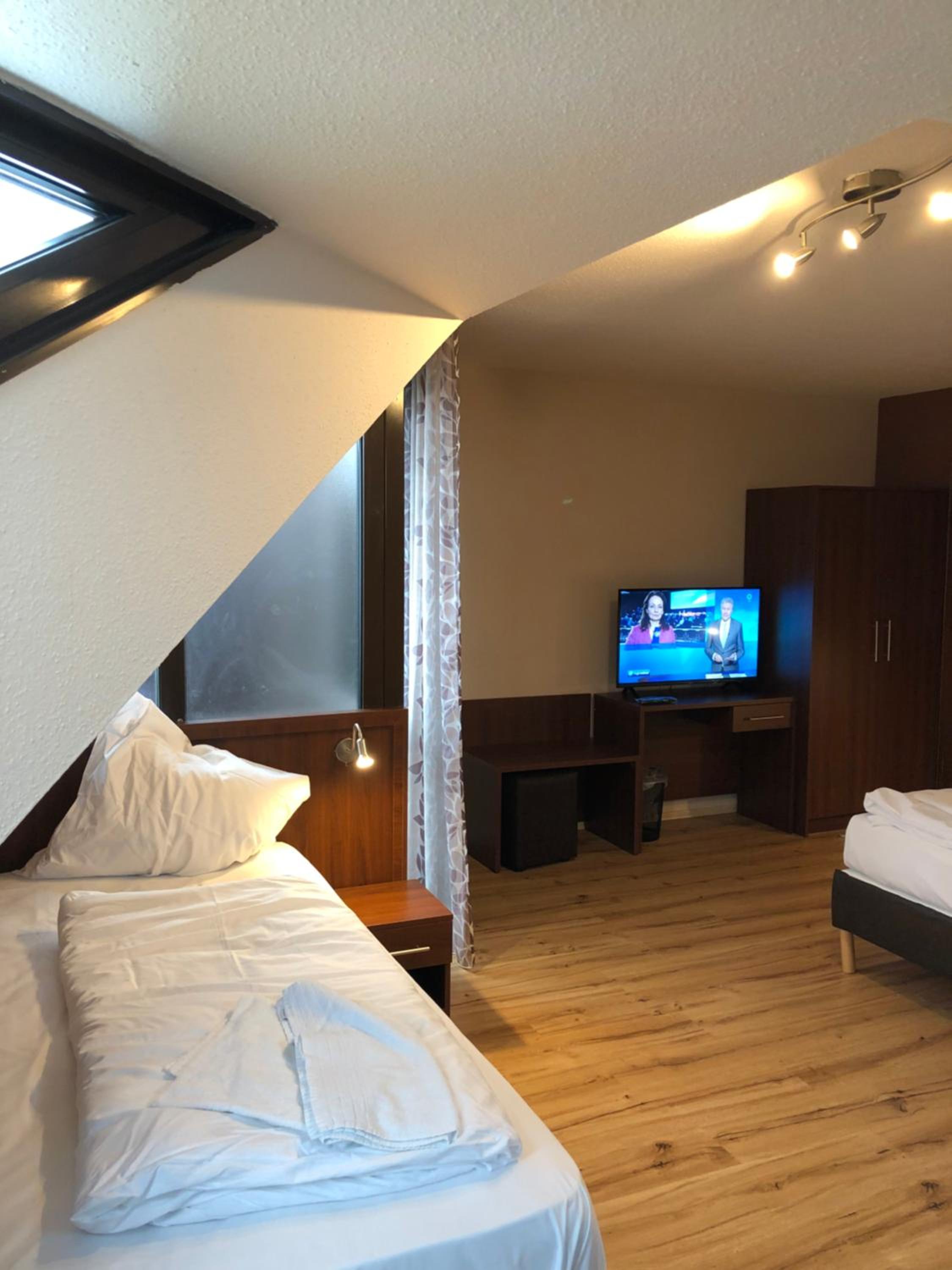 Quadruple Room with Shared Shower and Toilet