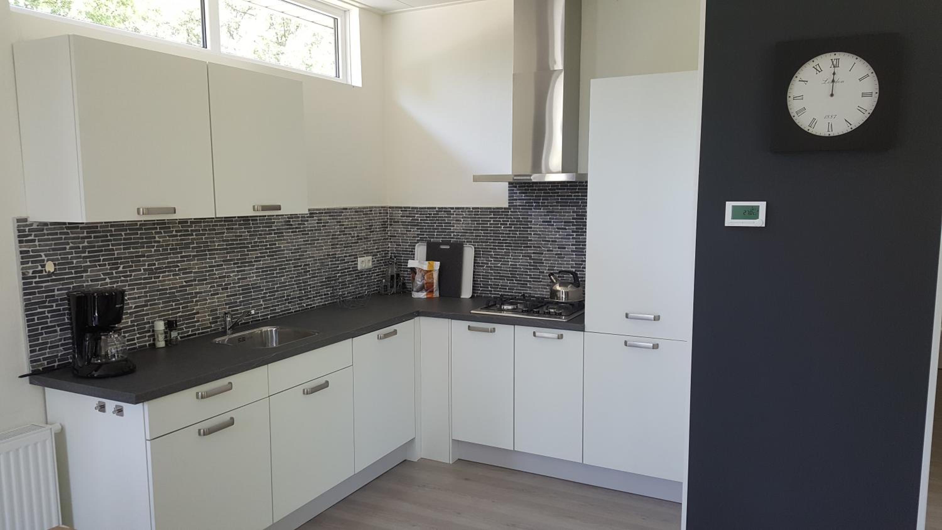 Three-Bedroom House - Photo 7