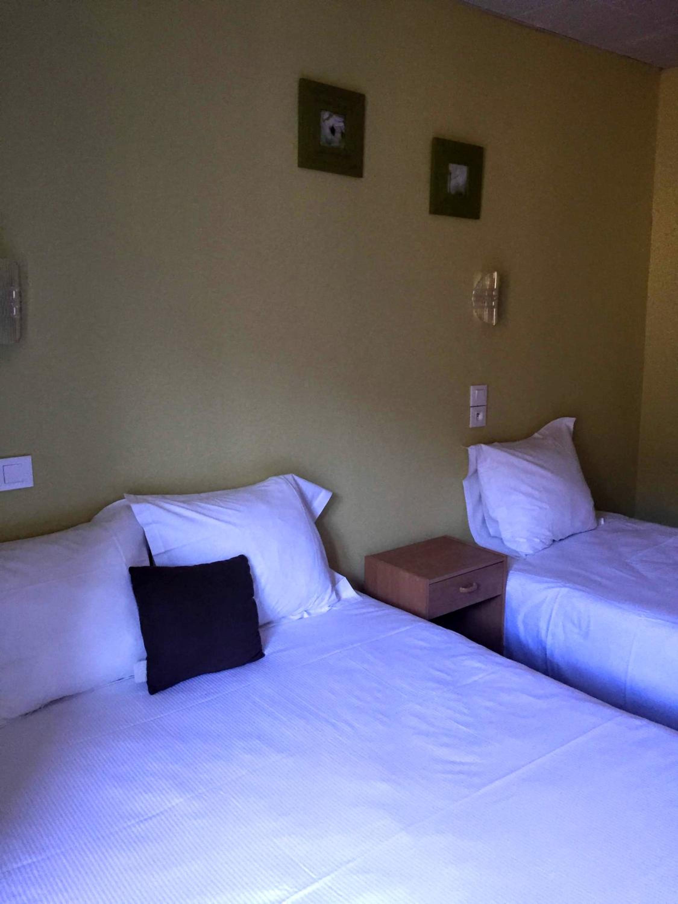 Triple Room (2 Adults + 1 Child) photo 2