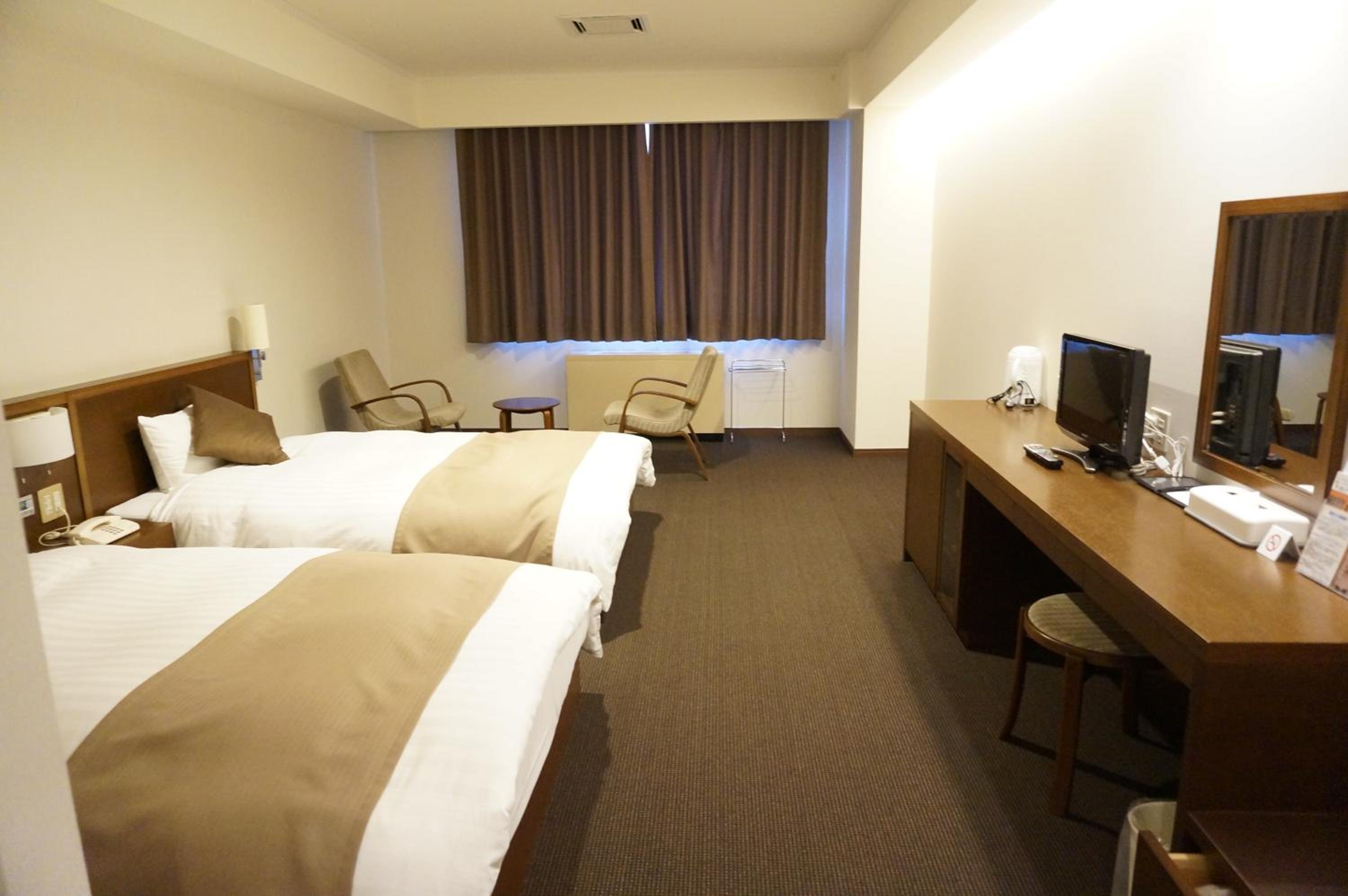 Twin Room - Non-Smoking - Photo 5