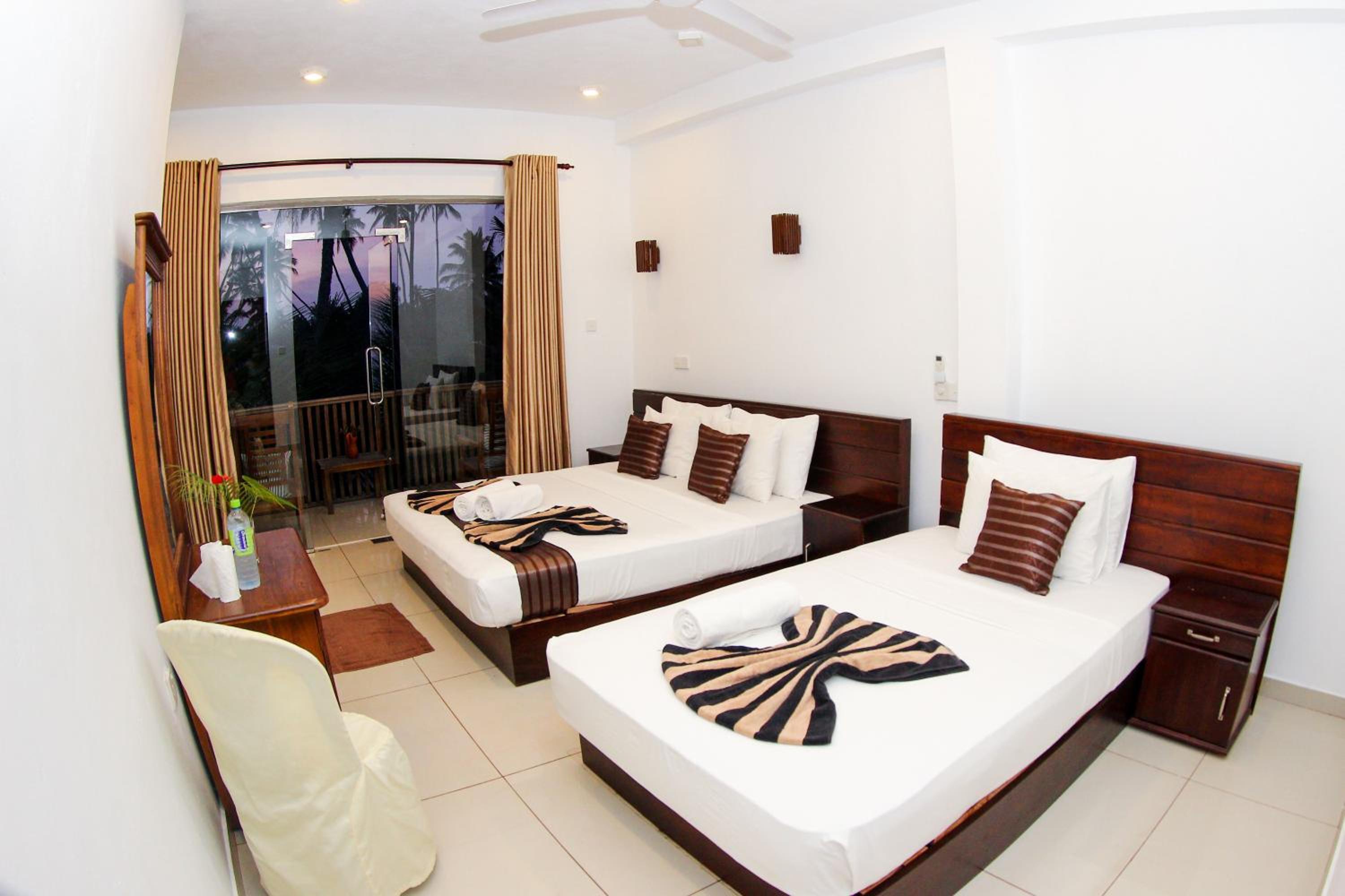 Standard Triple Room with Sea View photo 1