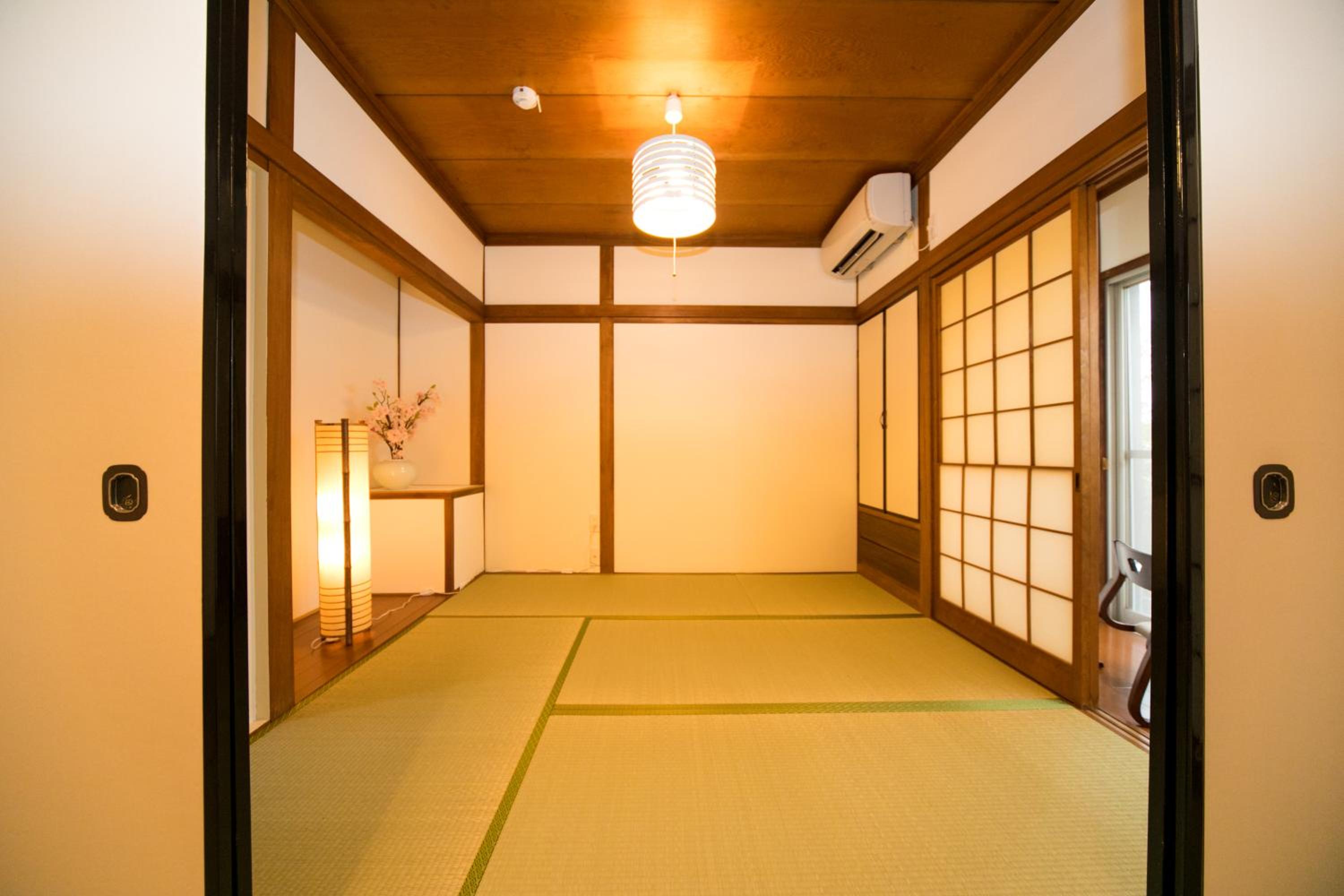 Three-Bedroom House - Photo 52
