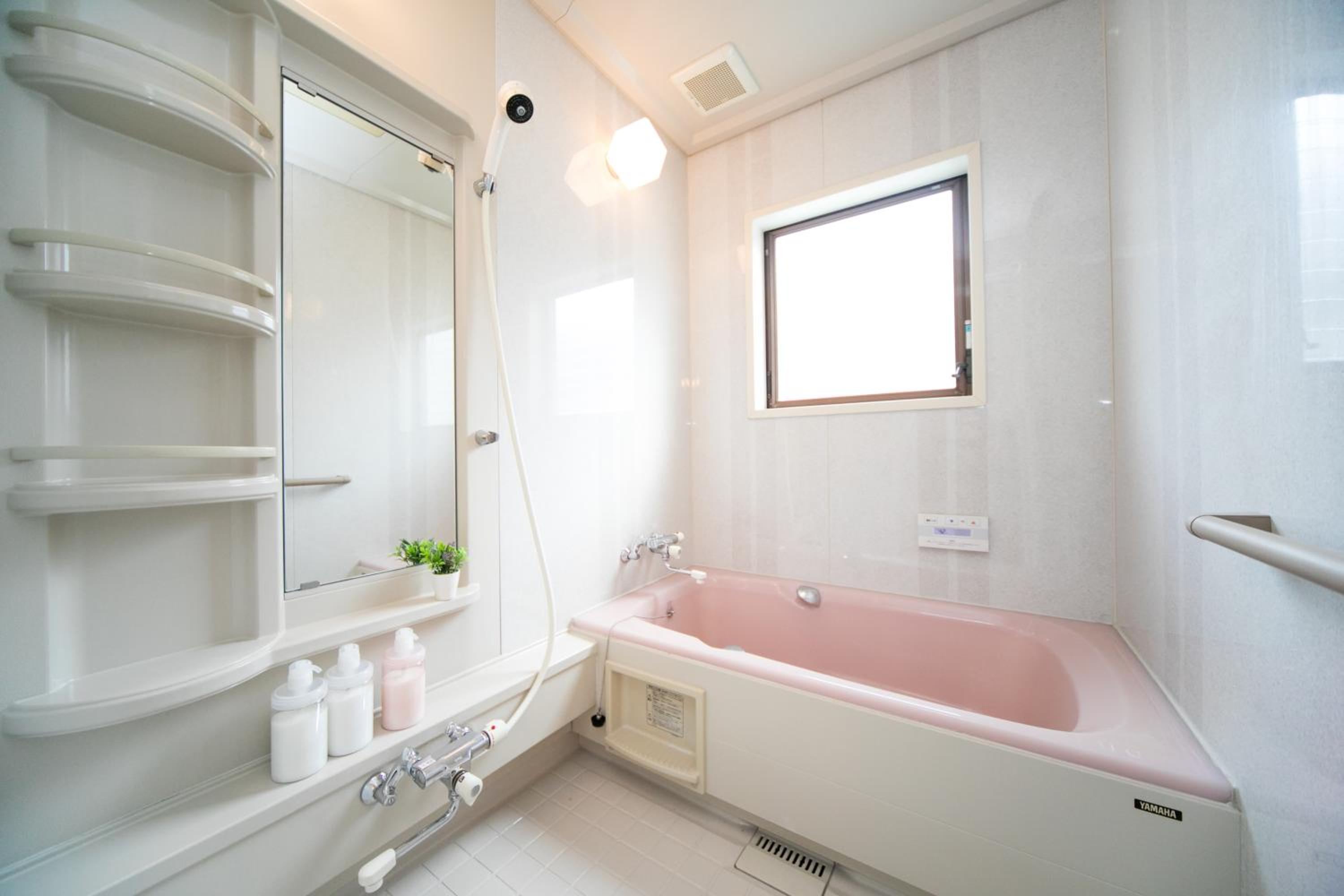 Three-Bedroom House - Photo 50