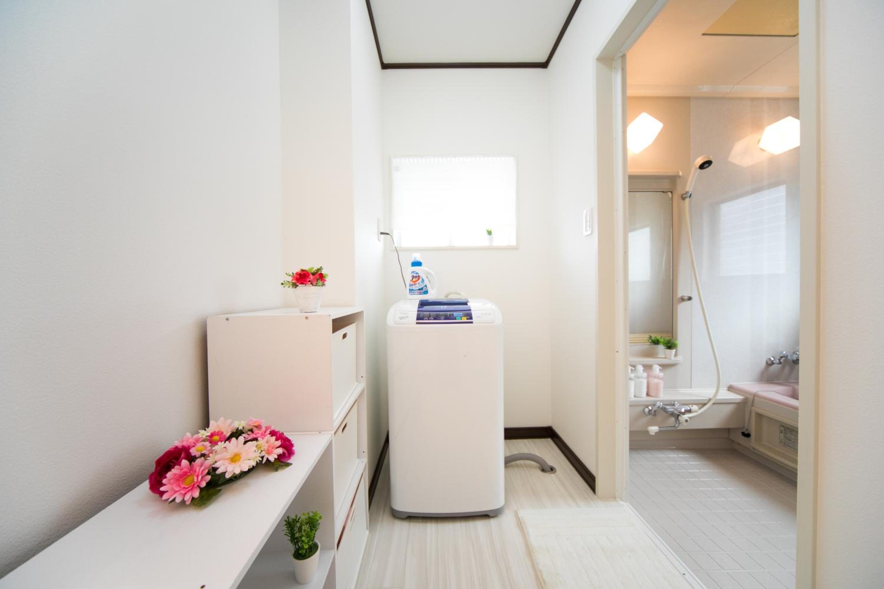 Three-Bedroom House - Photo 49