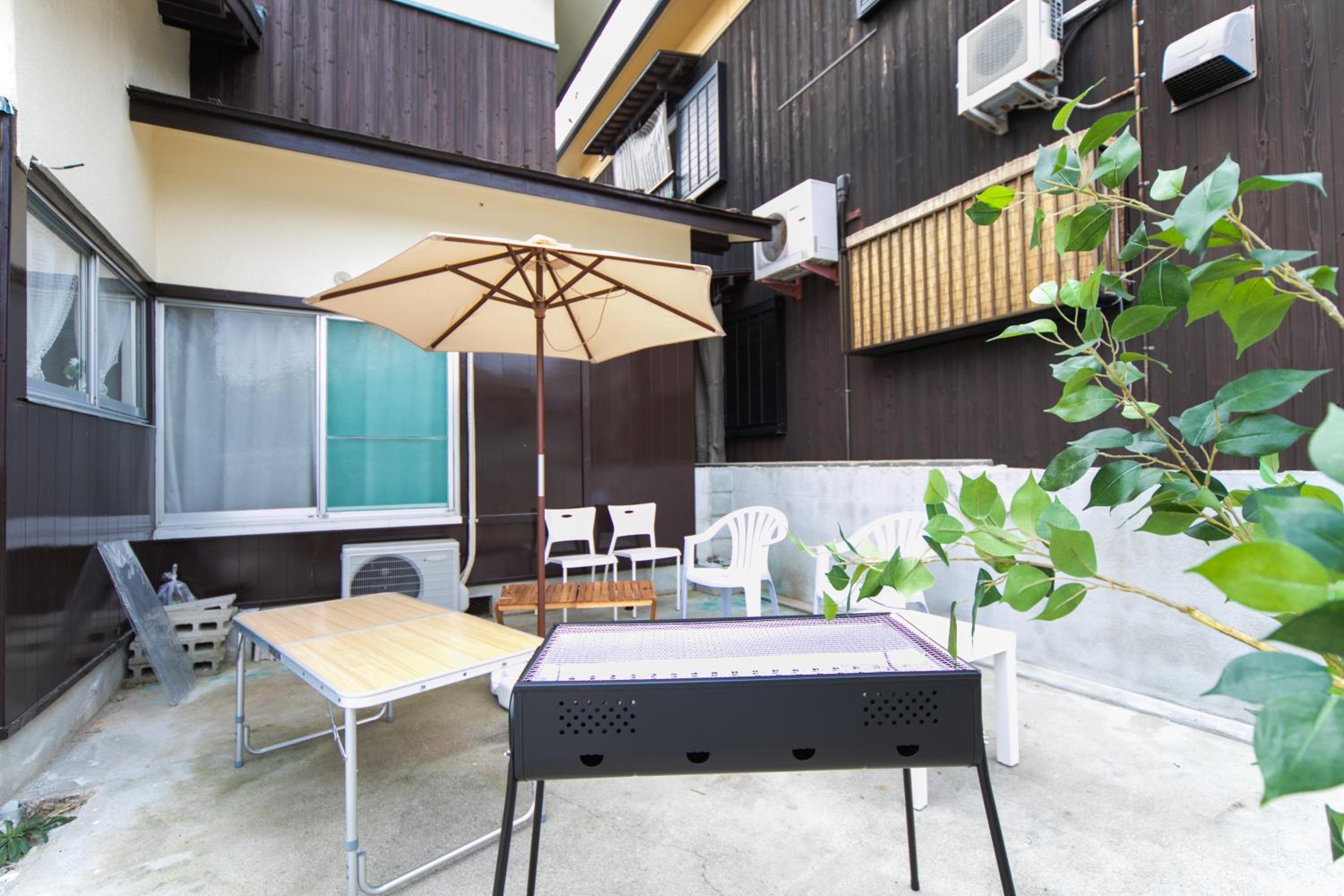 Three-Bedroom House - Photo 42