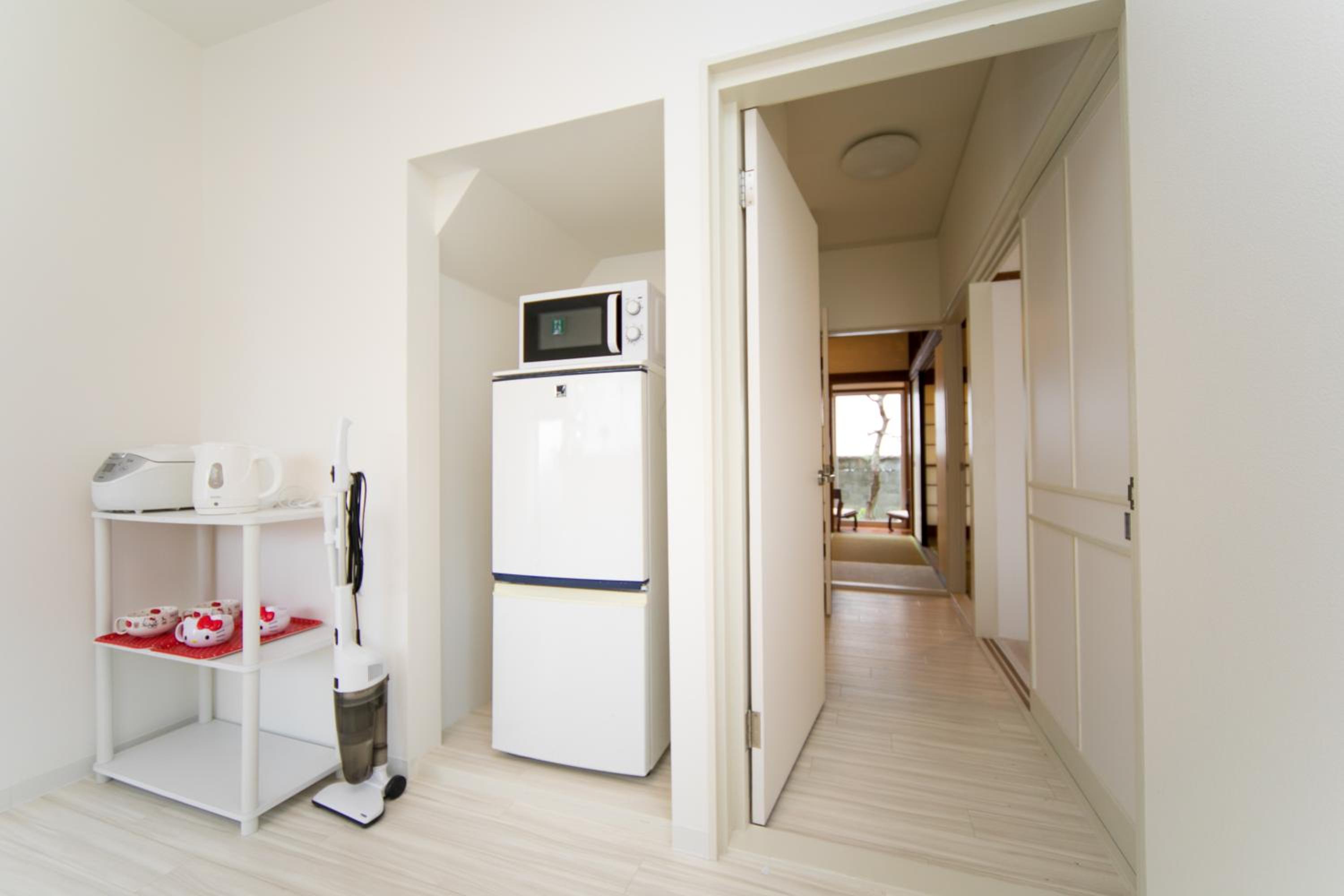 Three-Bedroom House - Photo 38