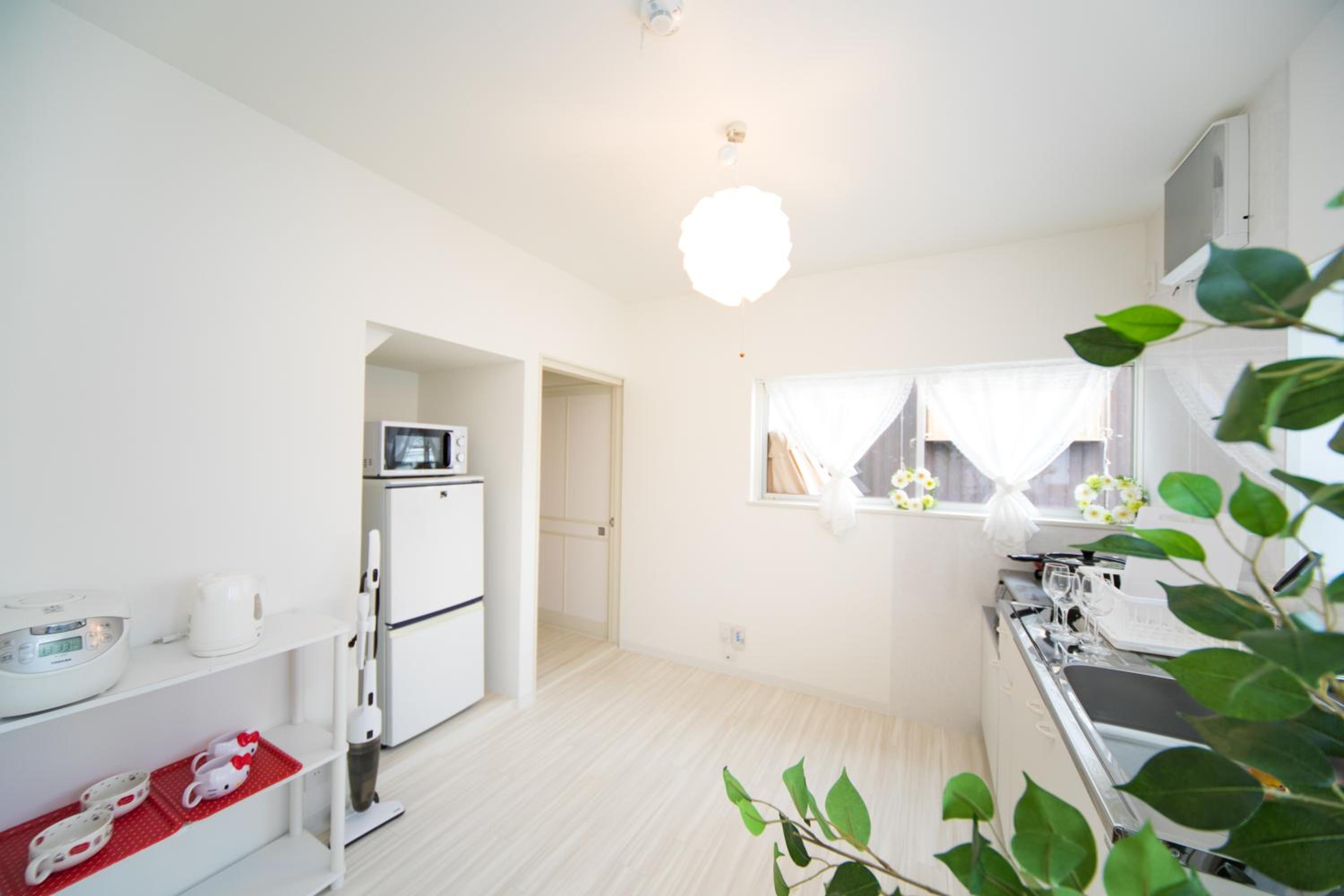 Three-Bedroom House - Photo 37