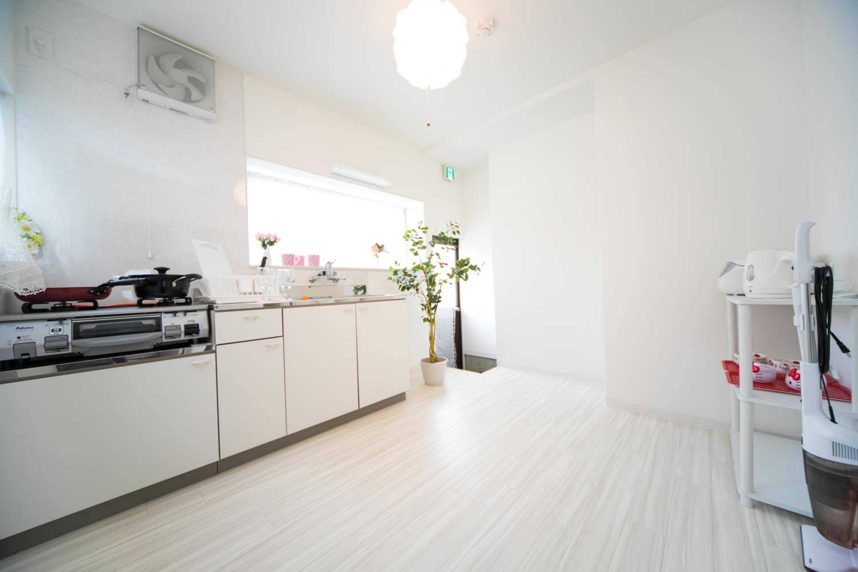 Three-Bedroom House - Photo 36