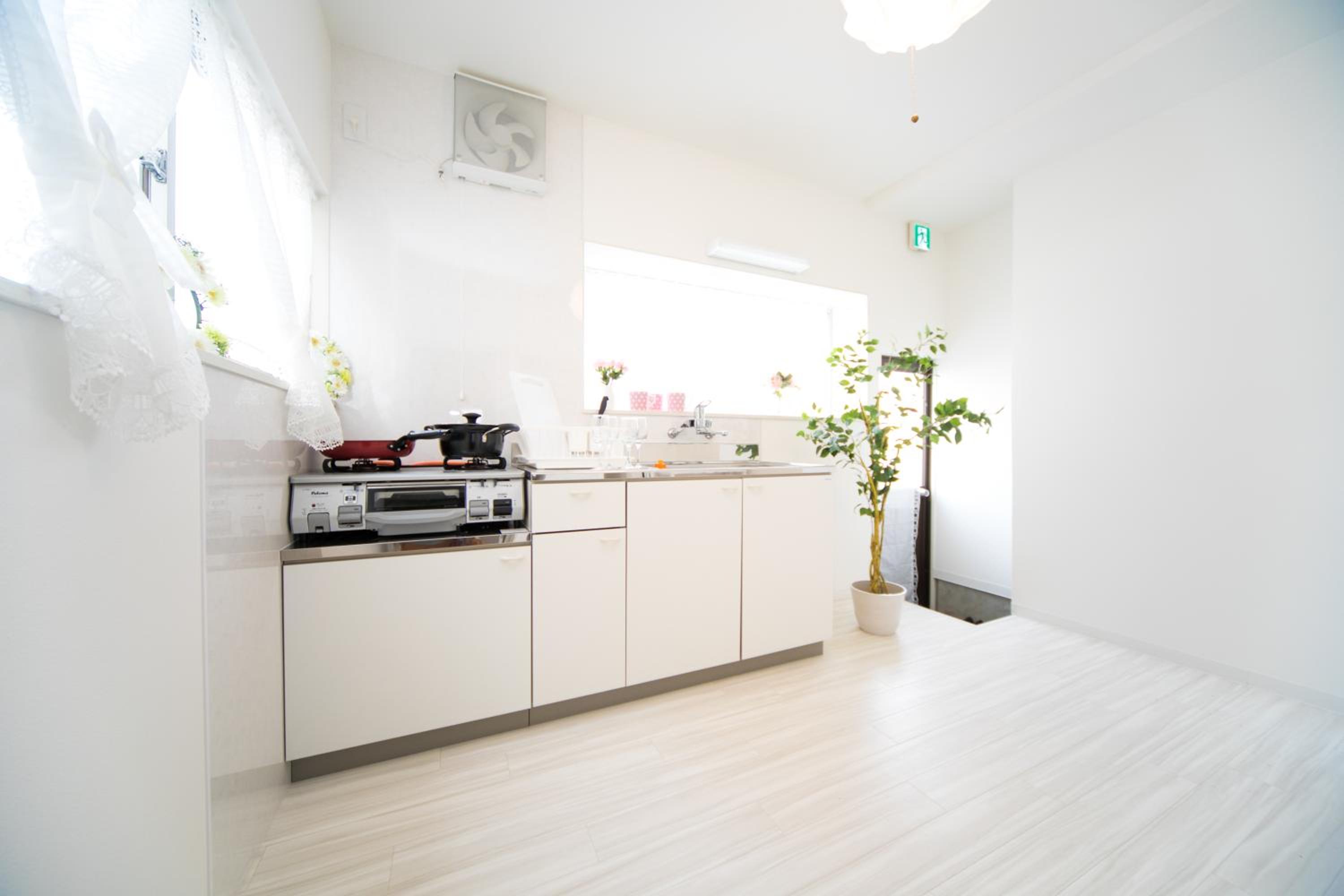Three-Bedroom House - Photo 35