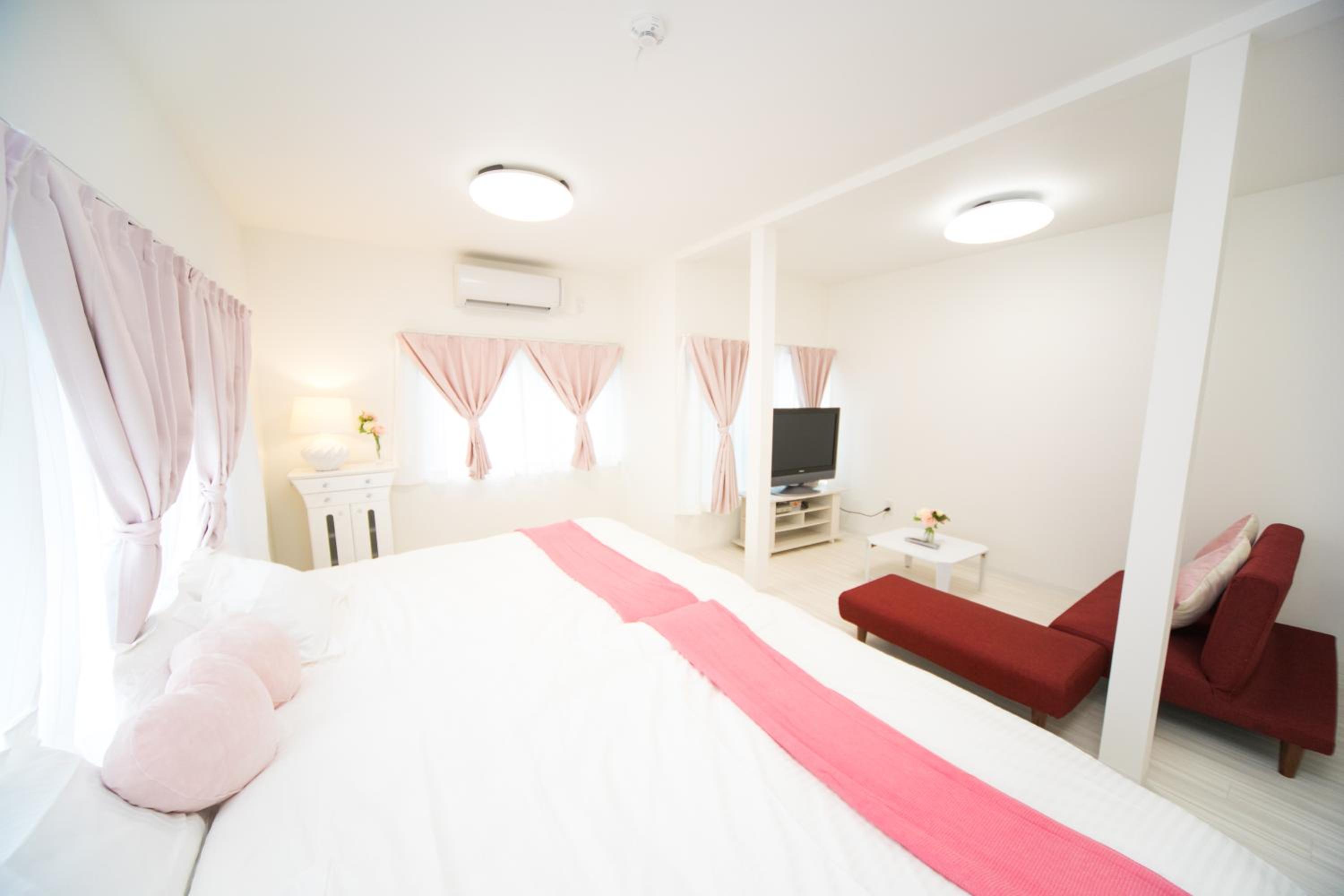 Three-Bedroom House - Photo 23