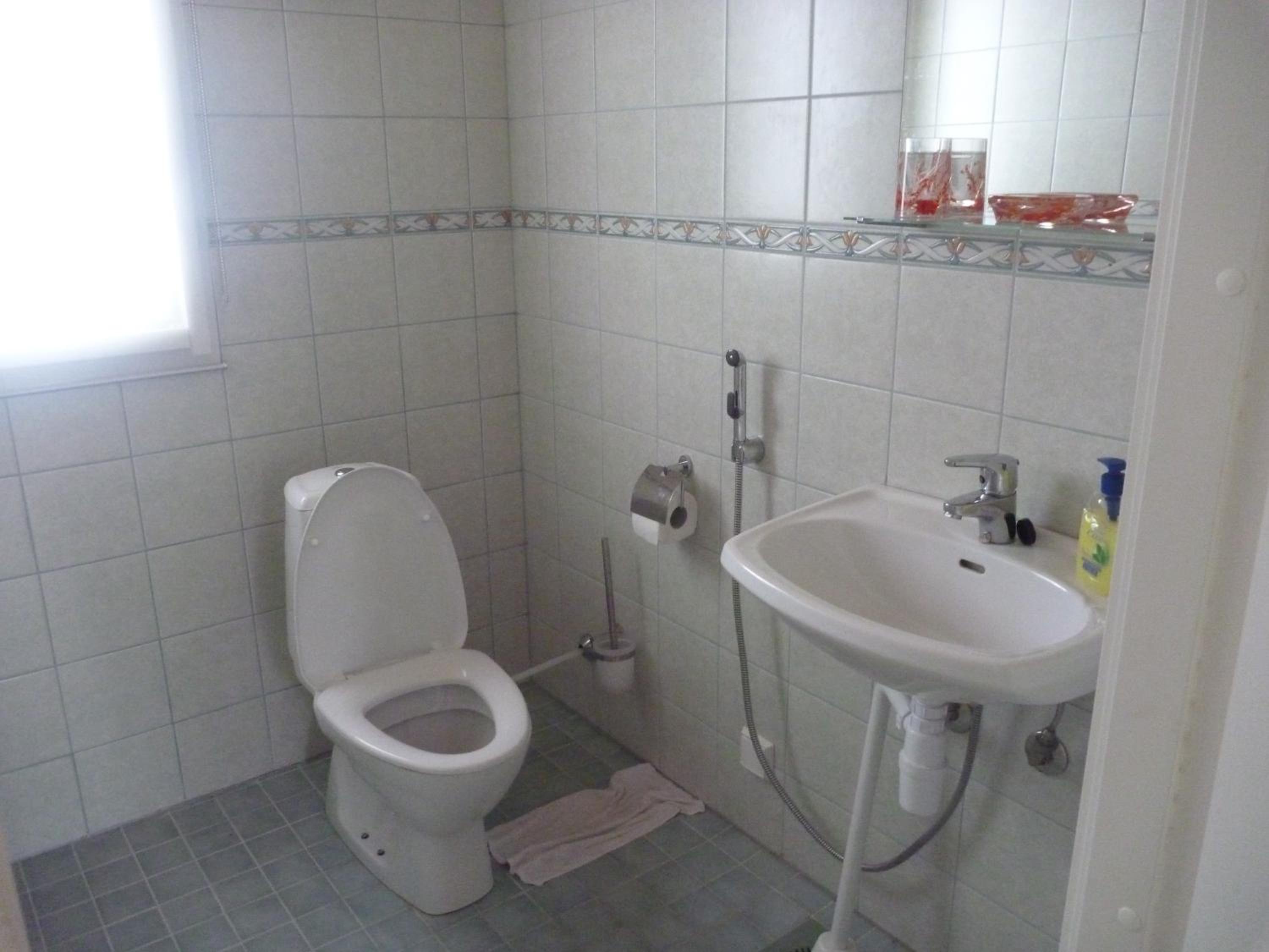 Four-Bedroom House - Photo 31