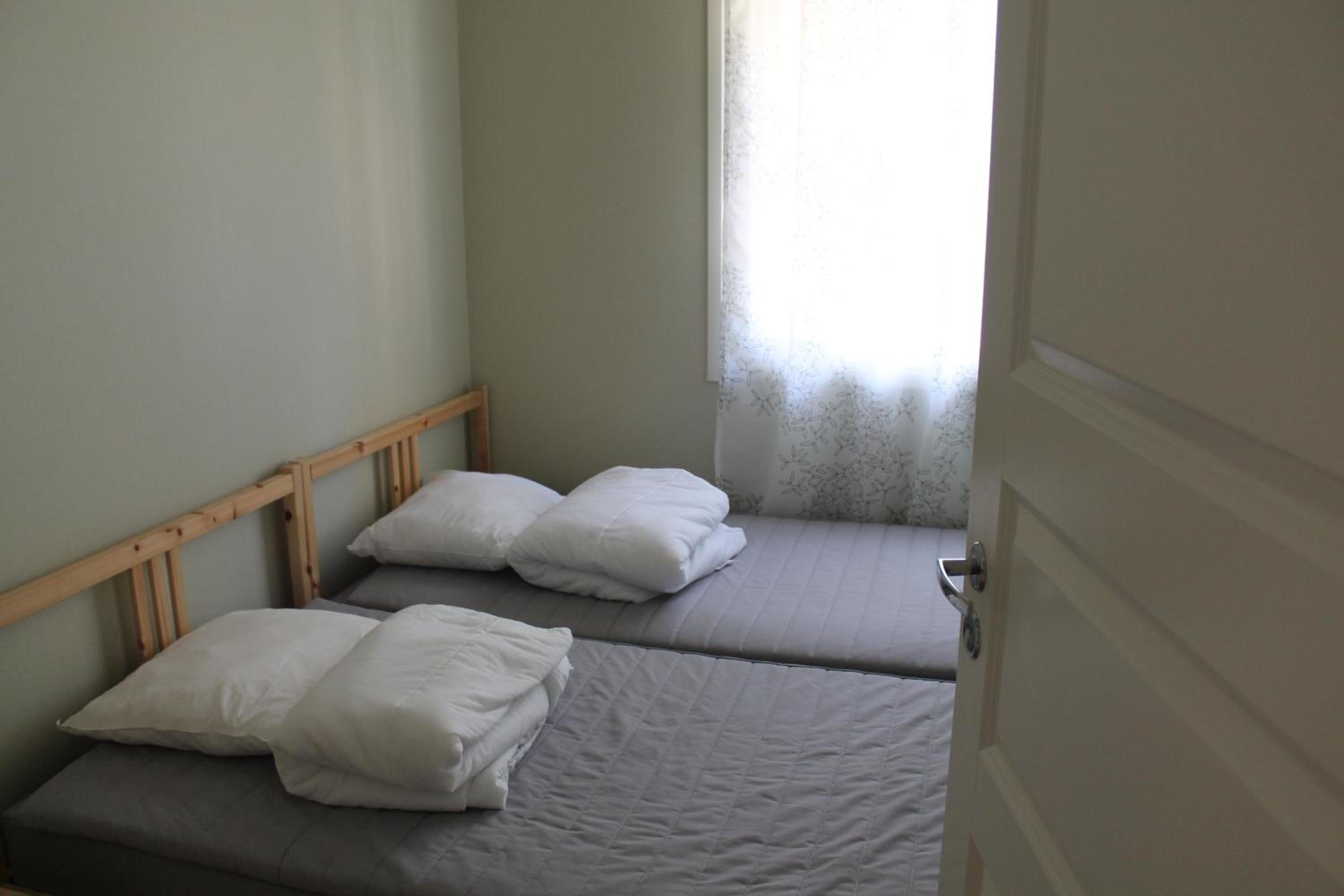 Four-Bedroom House - Photo 49
