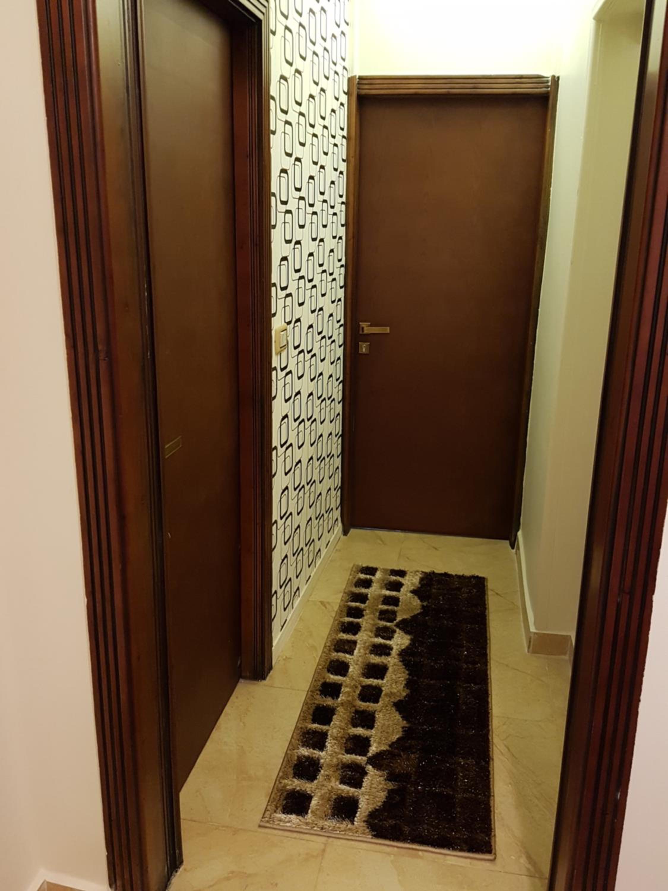 Three-Bedroom Apartment - Photo 23