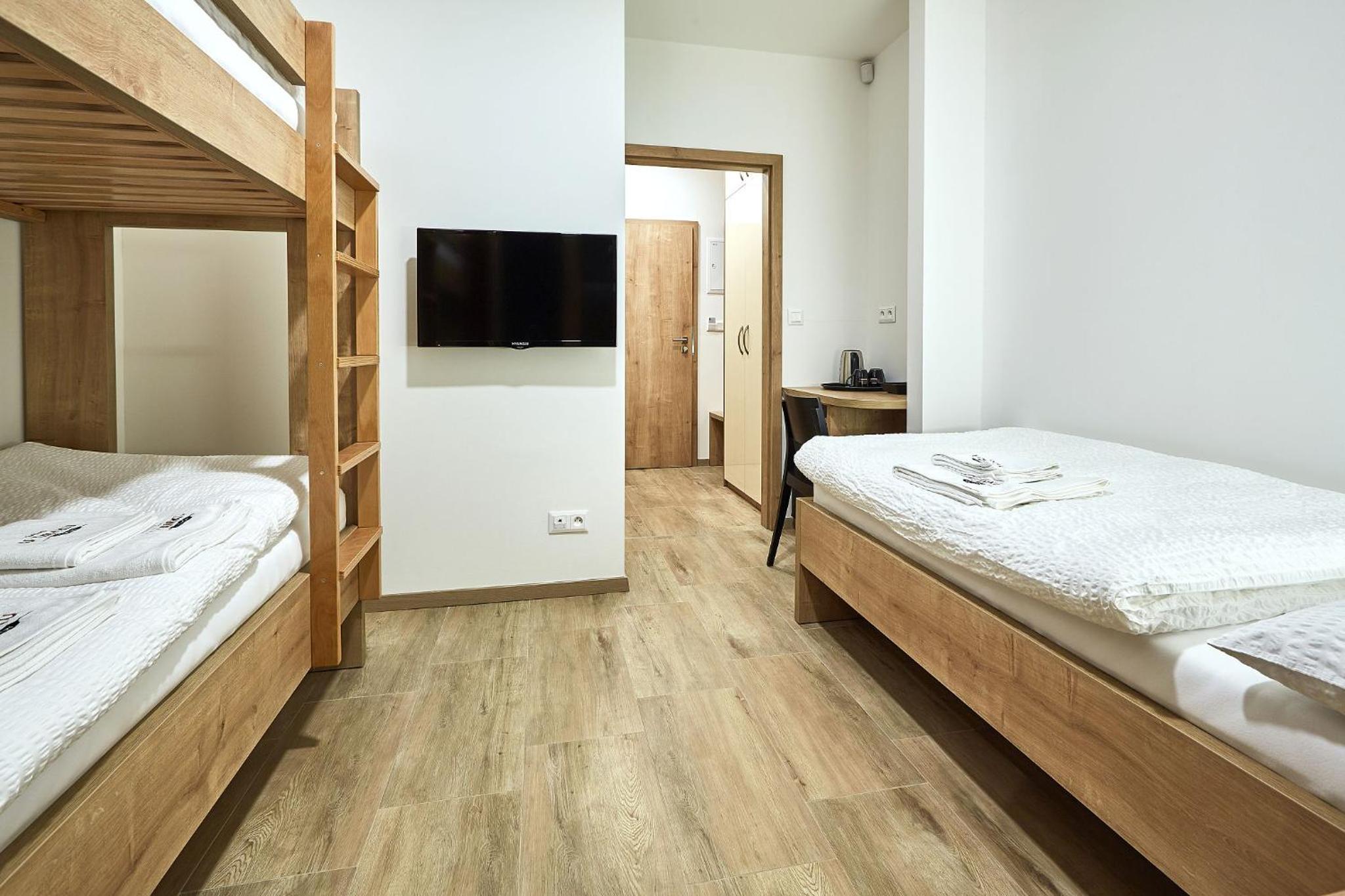 Deluxe Triple Room with Balcony photo 1