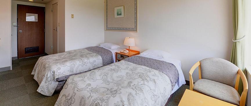 Twin Room with Garden View - Smoking photo 2