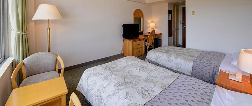 Twin Room with Garden View - Smoking photo 1