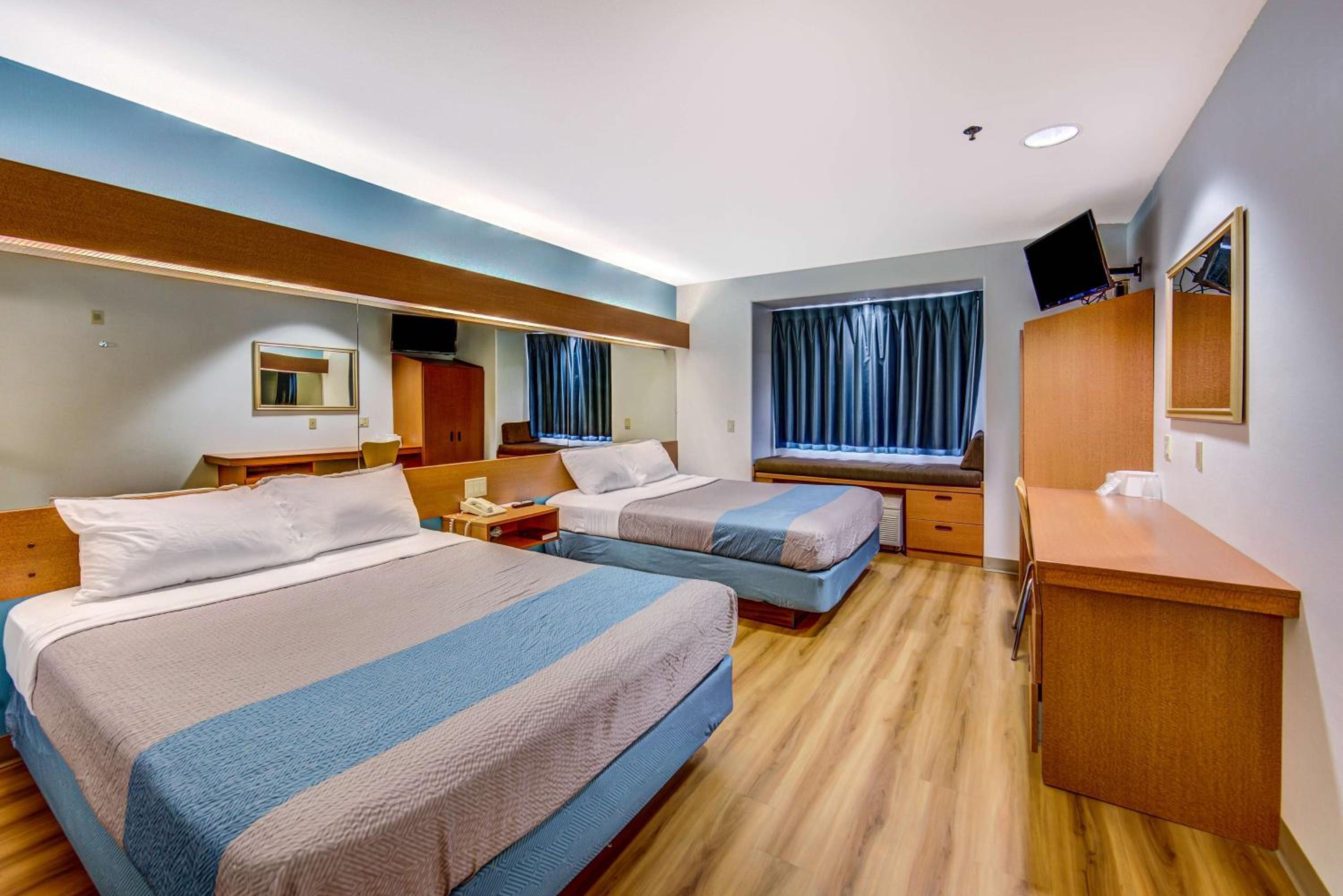 Queen Room with Two Queen Beds - Photo 1