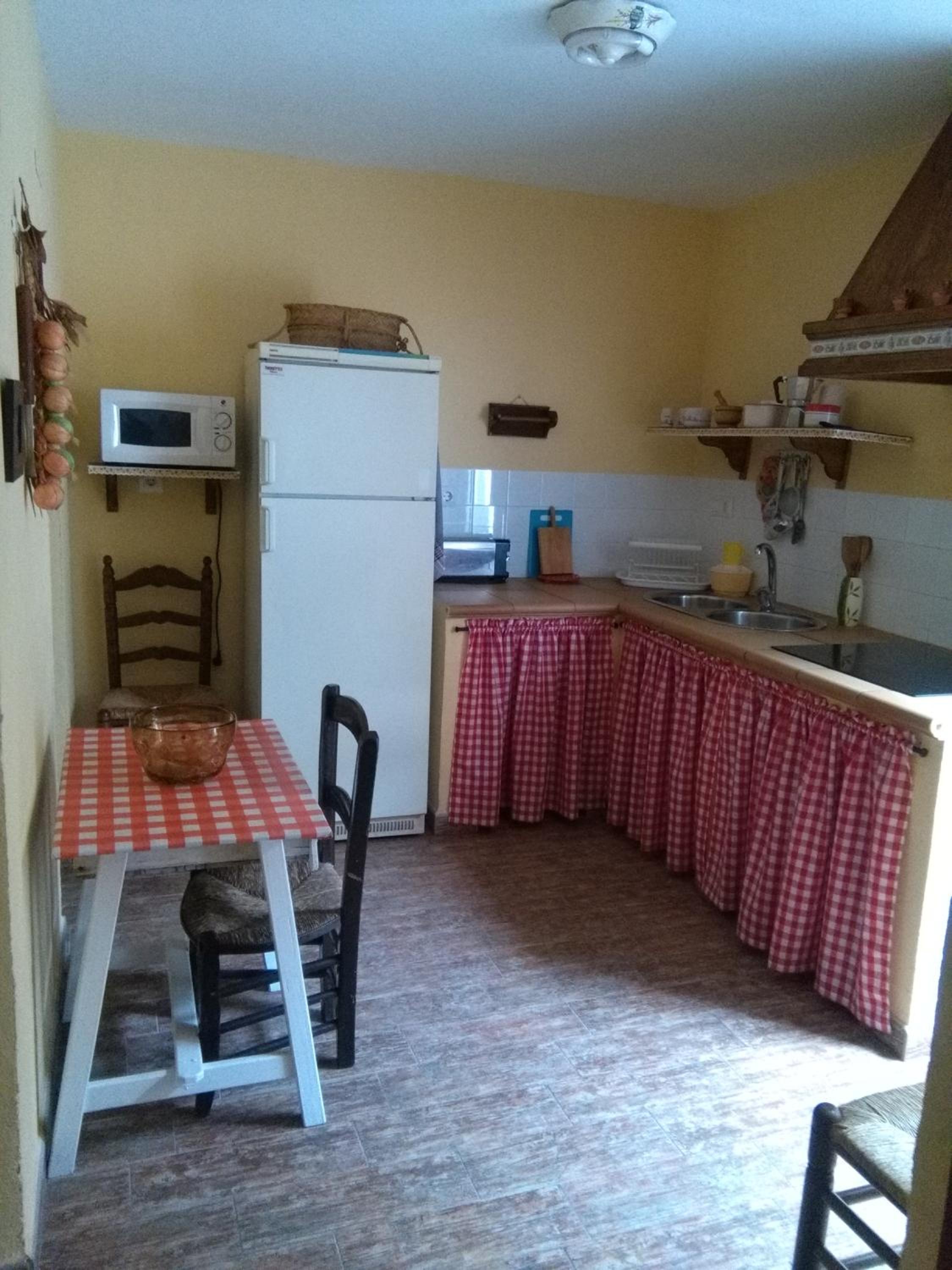 Three-Bedroom House - Photo 27
