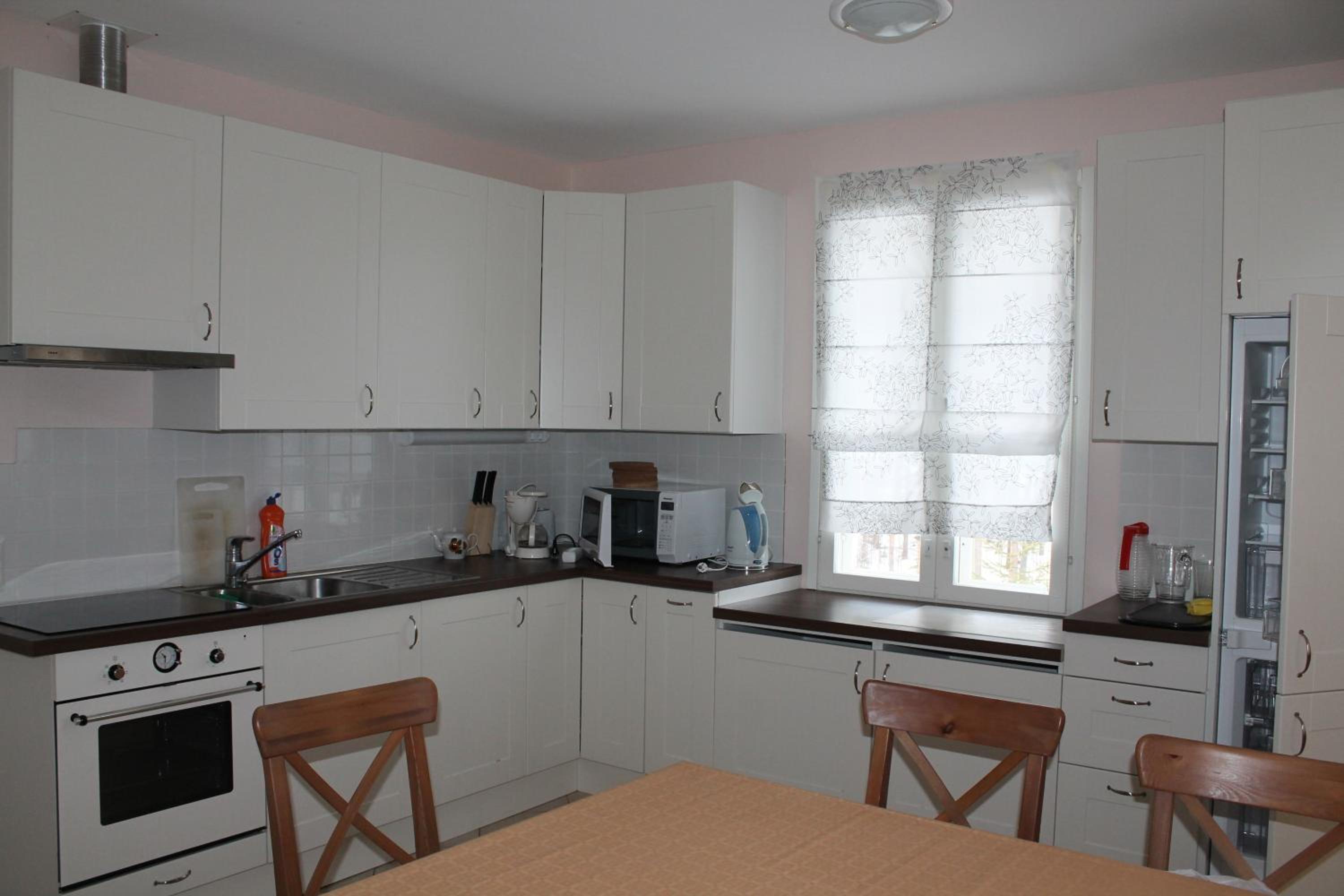 Three-Bedroom House - Photo 17