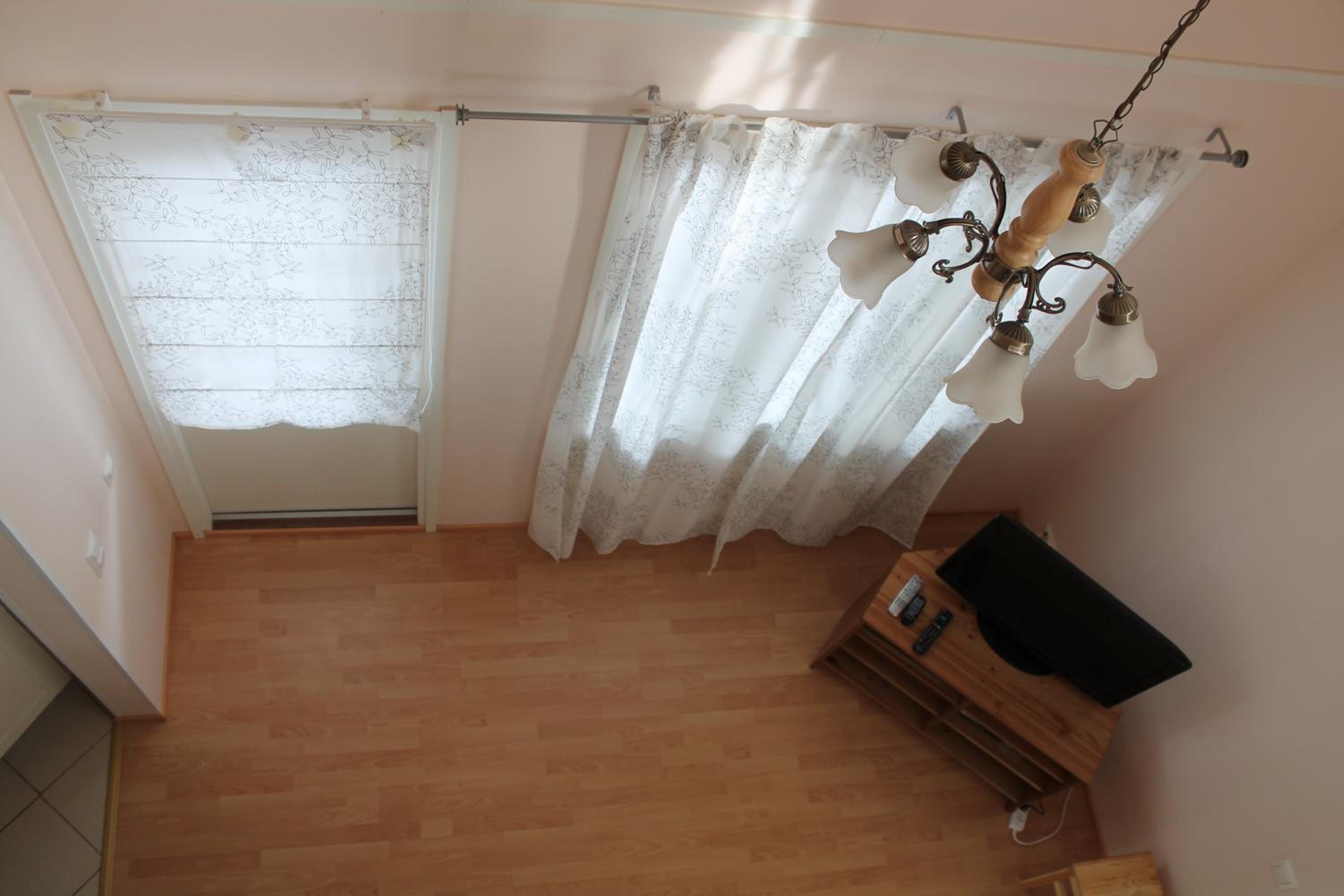 Three-Bedroom House - Photo 27