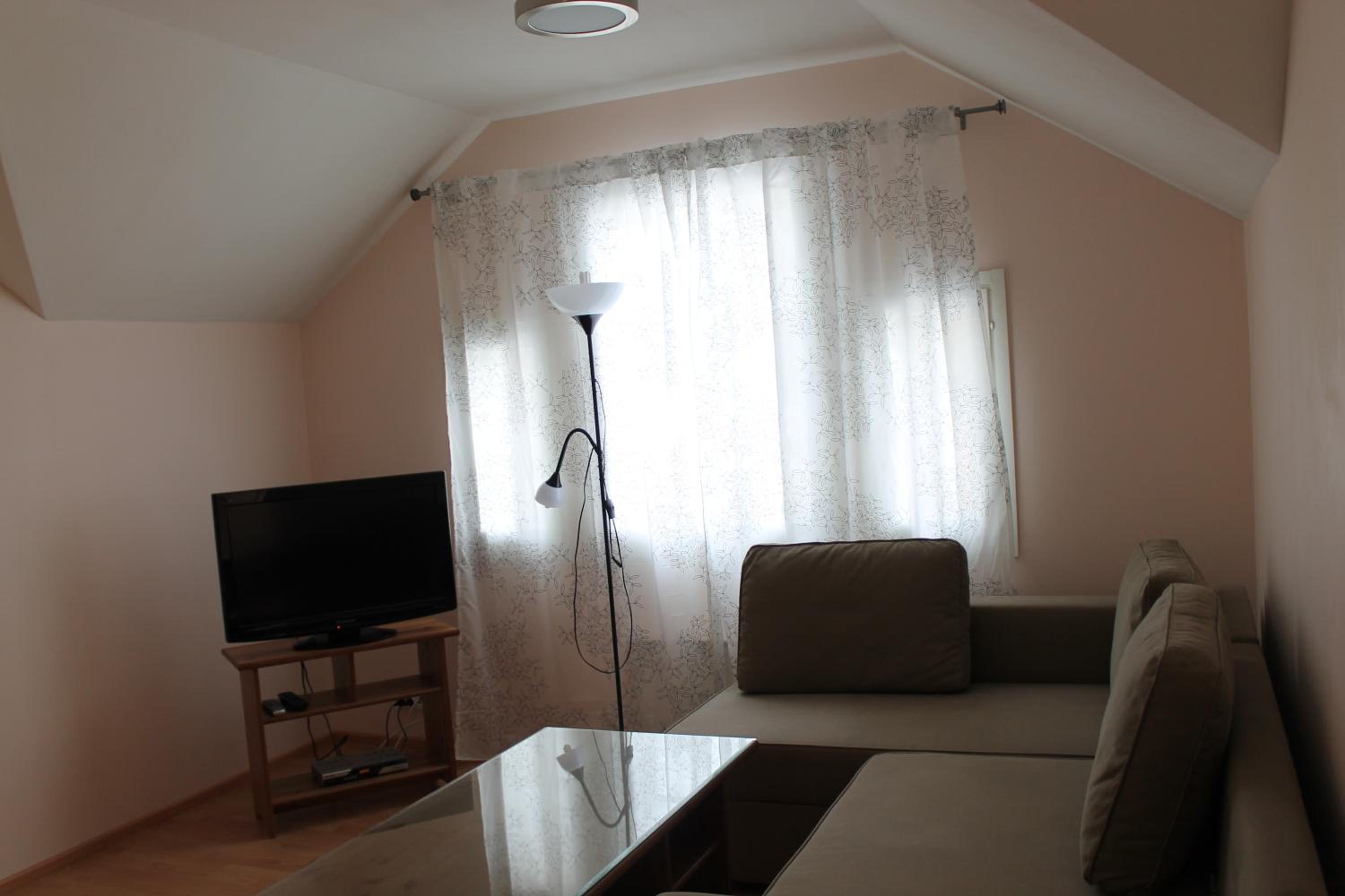 Three-Bedroom House - Photo 29