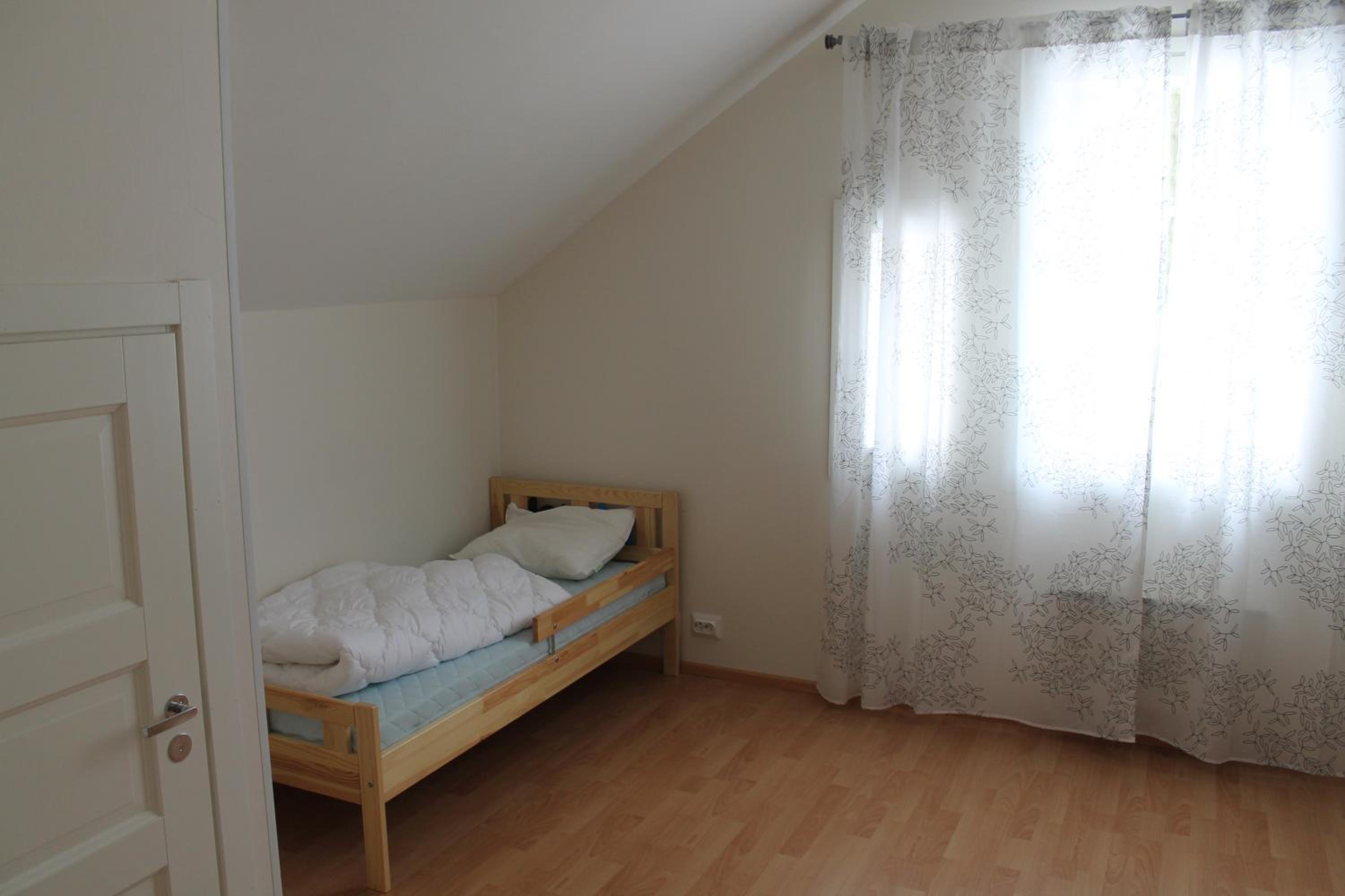 Three-Bedroom House - Photo 34