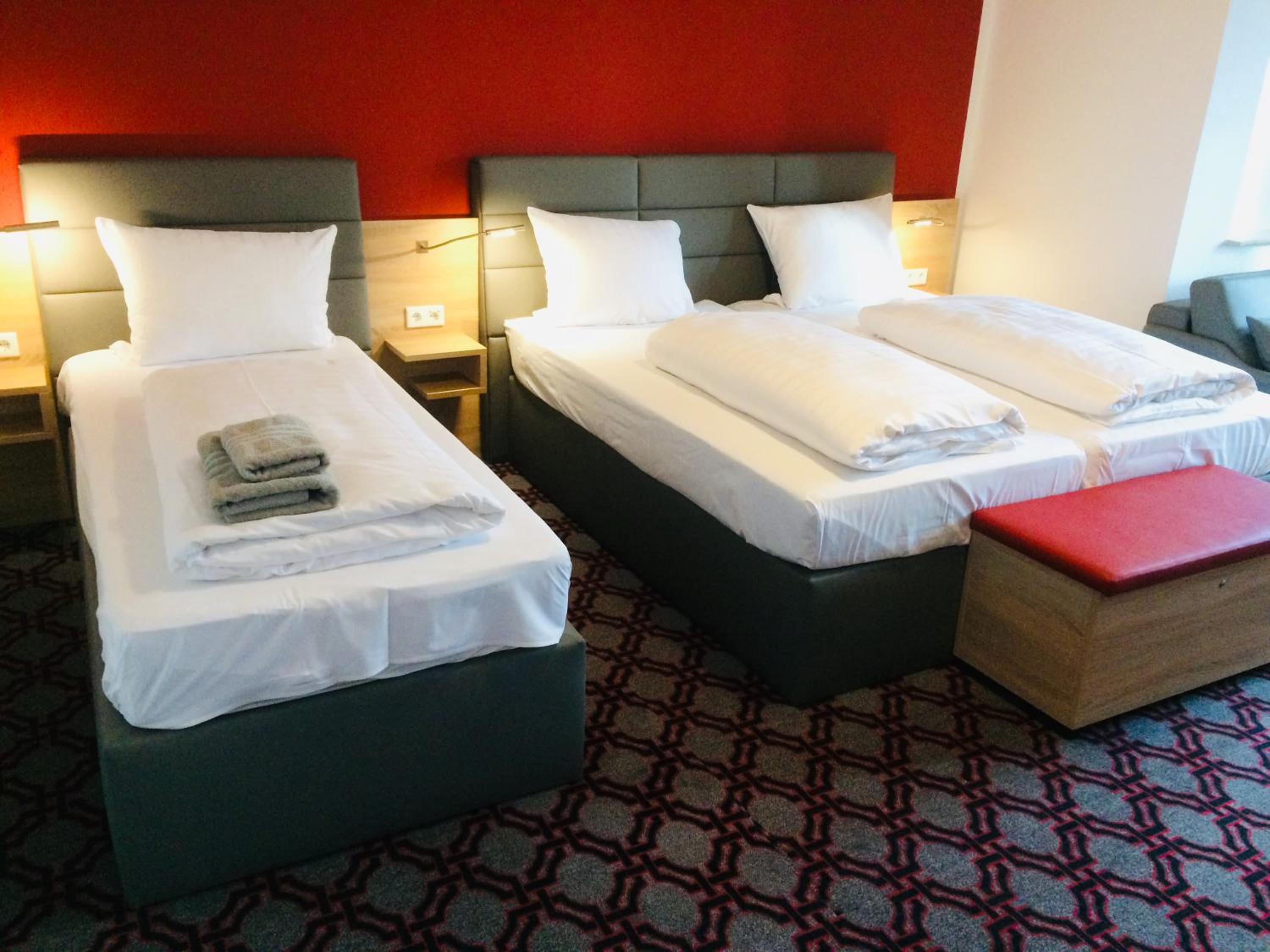 Triple Room (2 Adults + 1 Child) photo 1