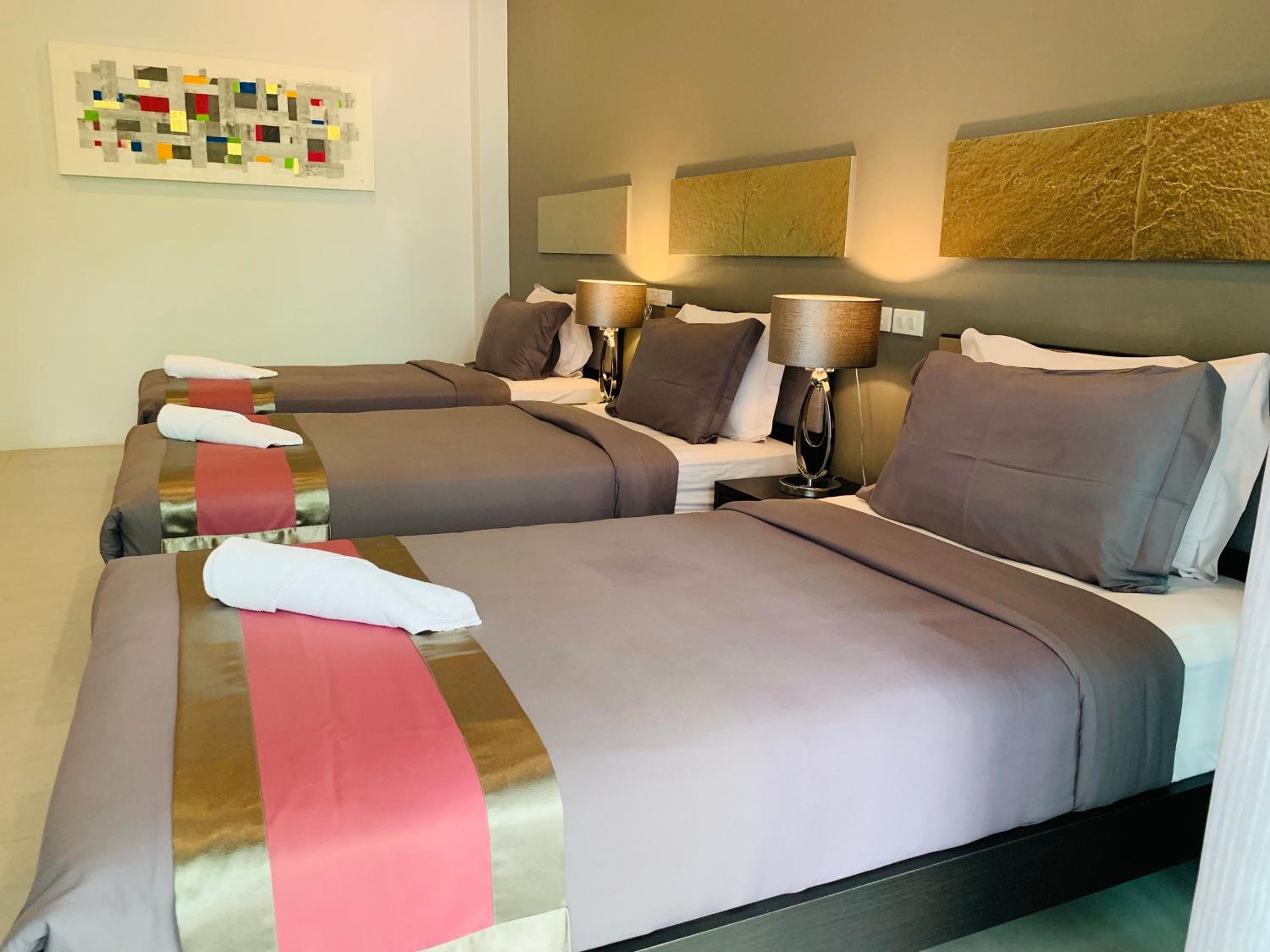 Deluxe Triple Room - Photo 10