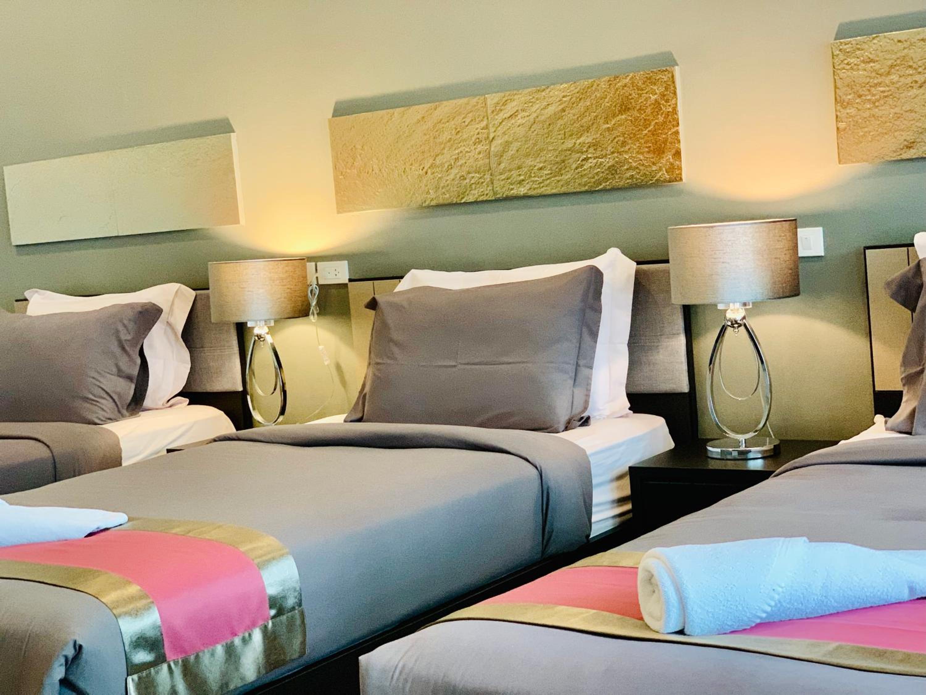 Deluxe Triple Room - Photo 8