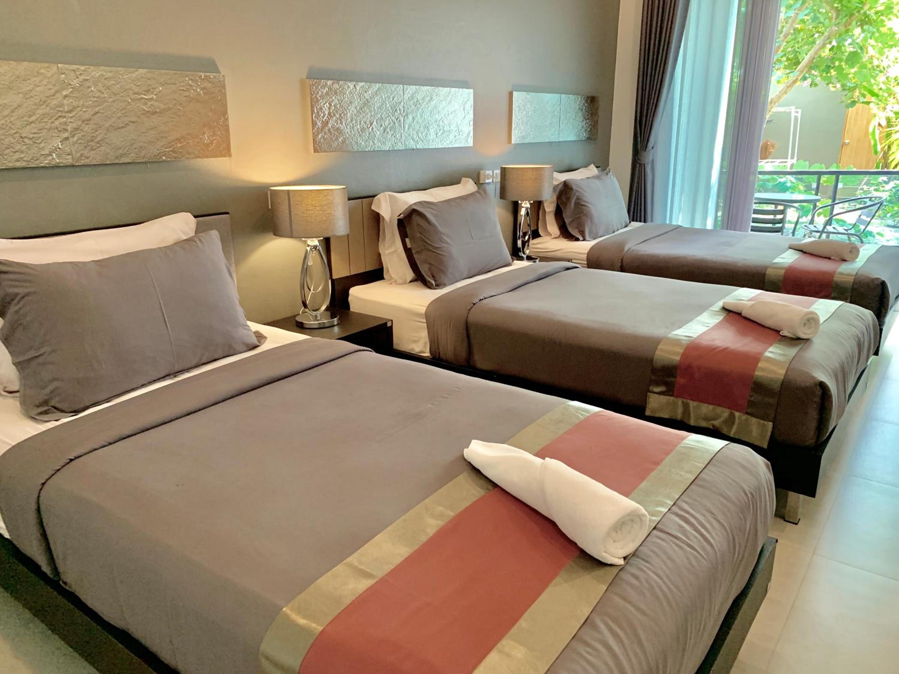 Deluxe Triple Room - Photo 1