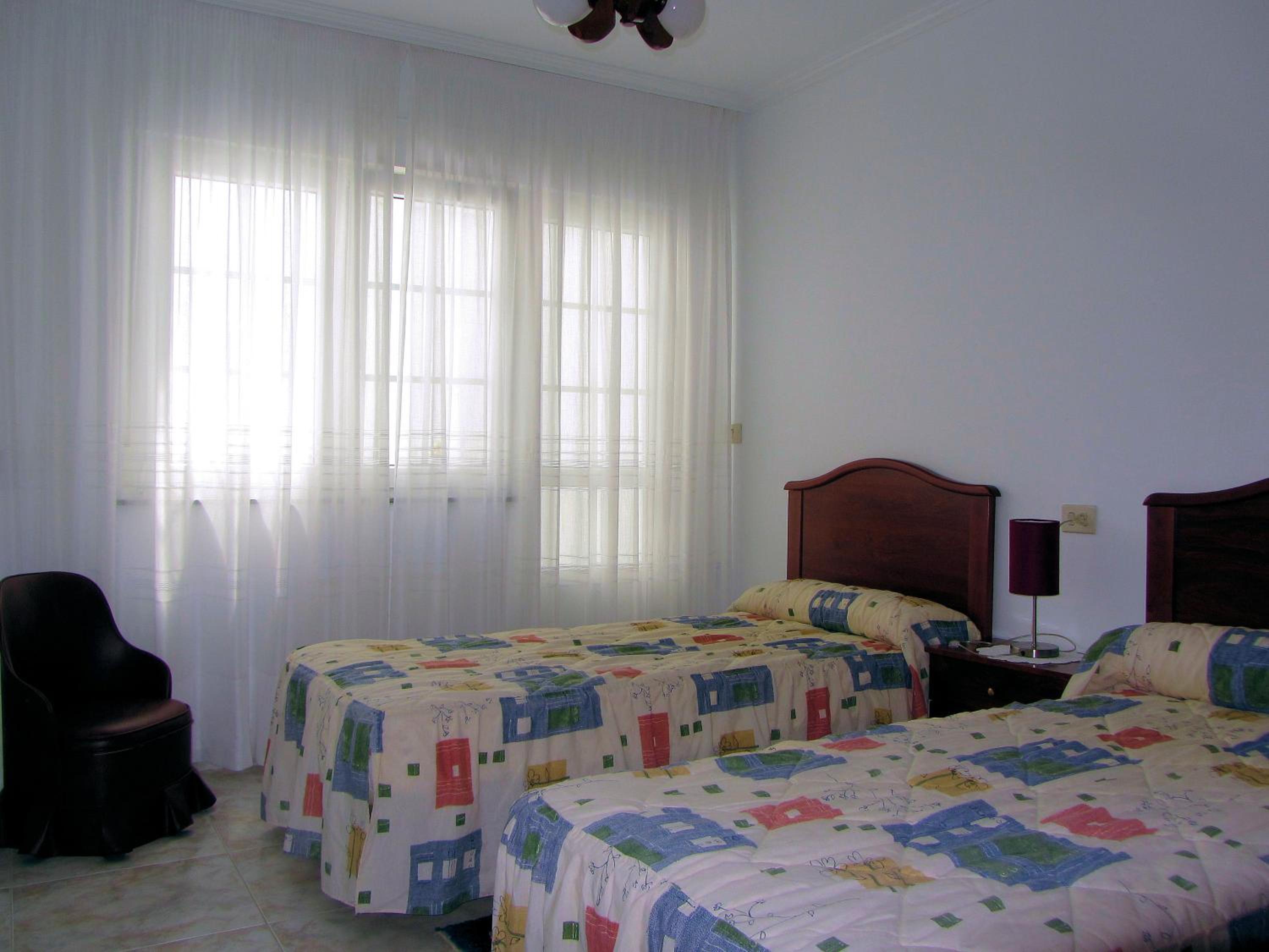 Three-Bedroom Apartment photo 2