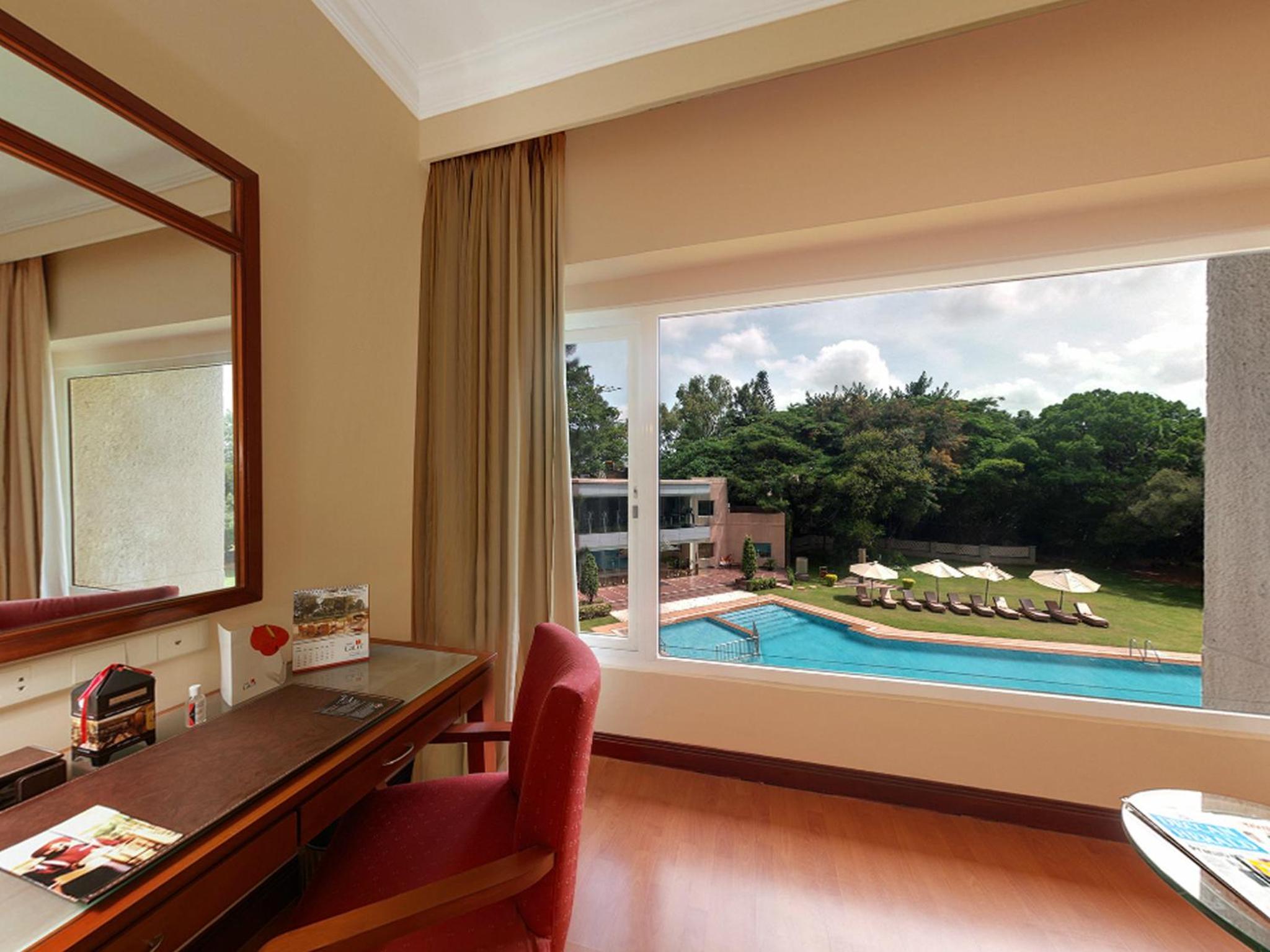 Premier Double Room with Pool View with 20% Discount on Food and Beverage and Spa and 10% Discount on Laundry service Premier Double Room with Pool View with 20% Discount on Food and Beverage and Spa and 10% Discount on Laundry service