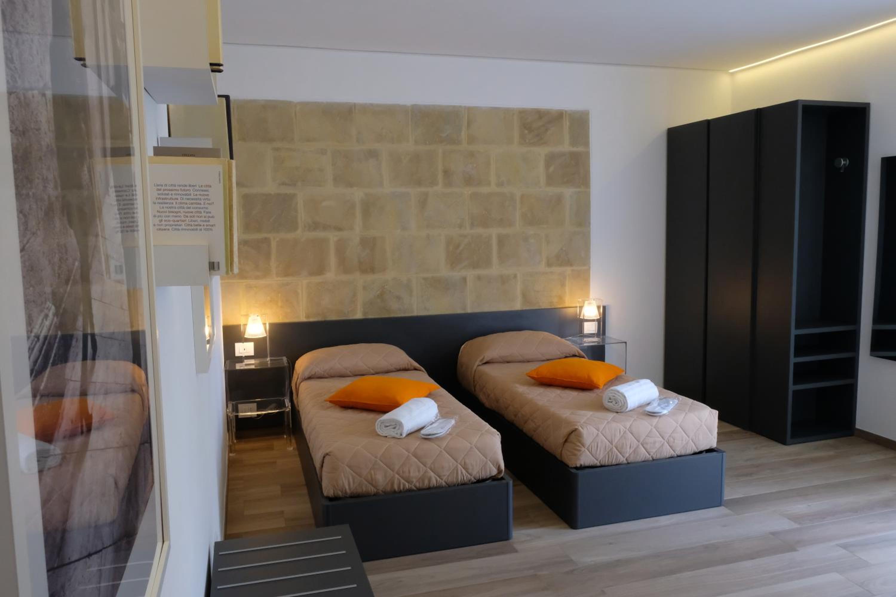 Quarto triplo com vista para o jardim