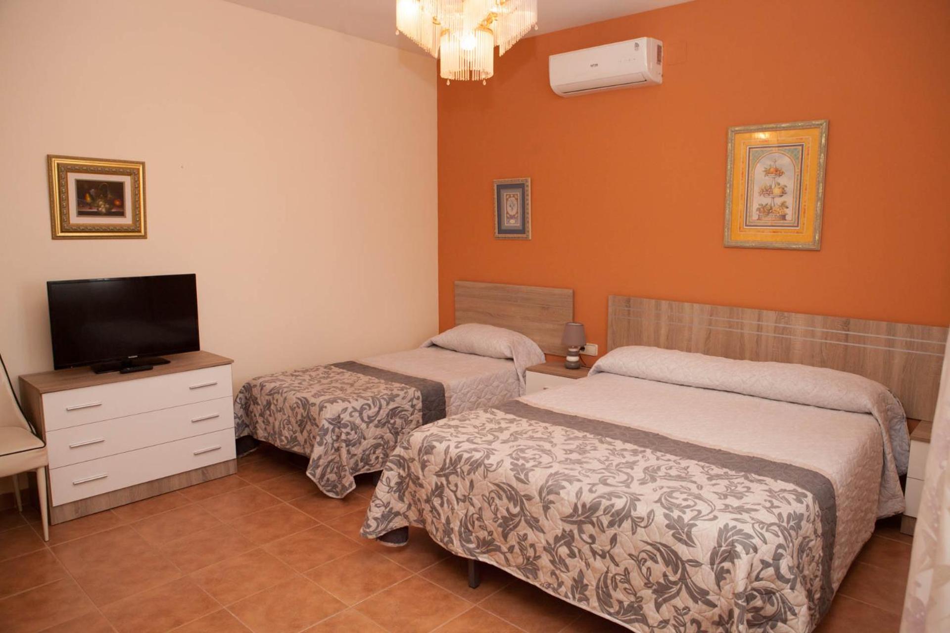 Habitación Triple con Baño Privado