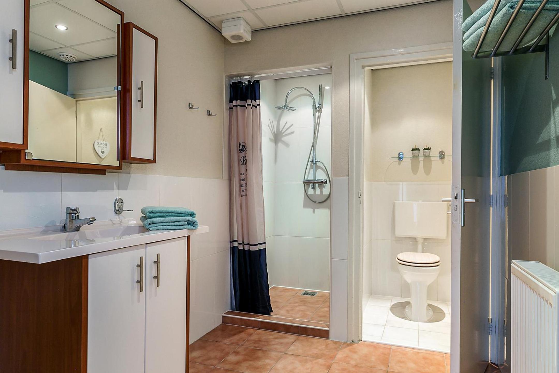Three-Bedroom Apartment - Photo 12
