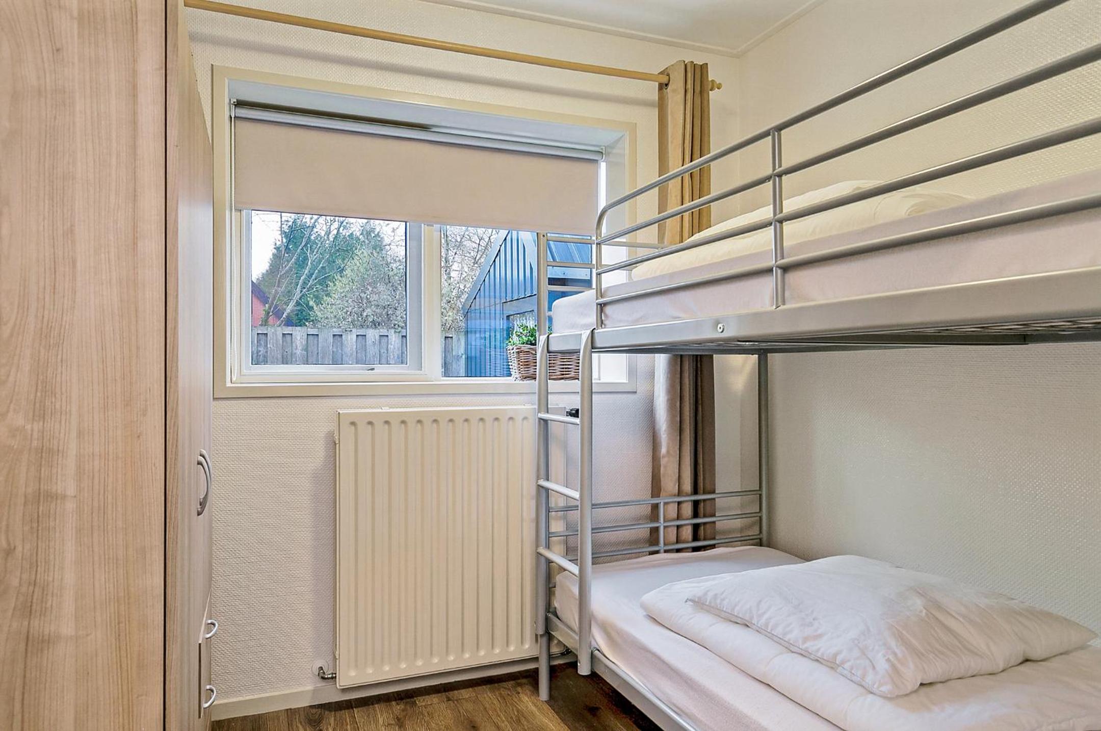Three-Bedroom Apartment - Photo 16