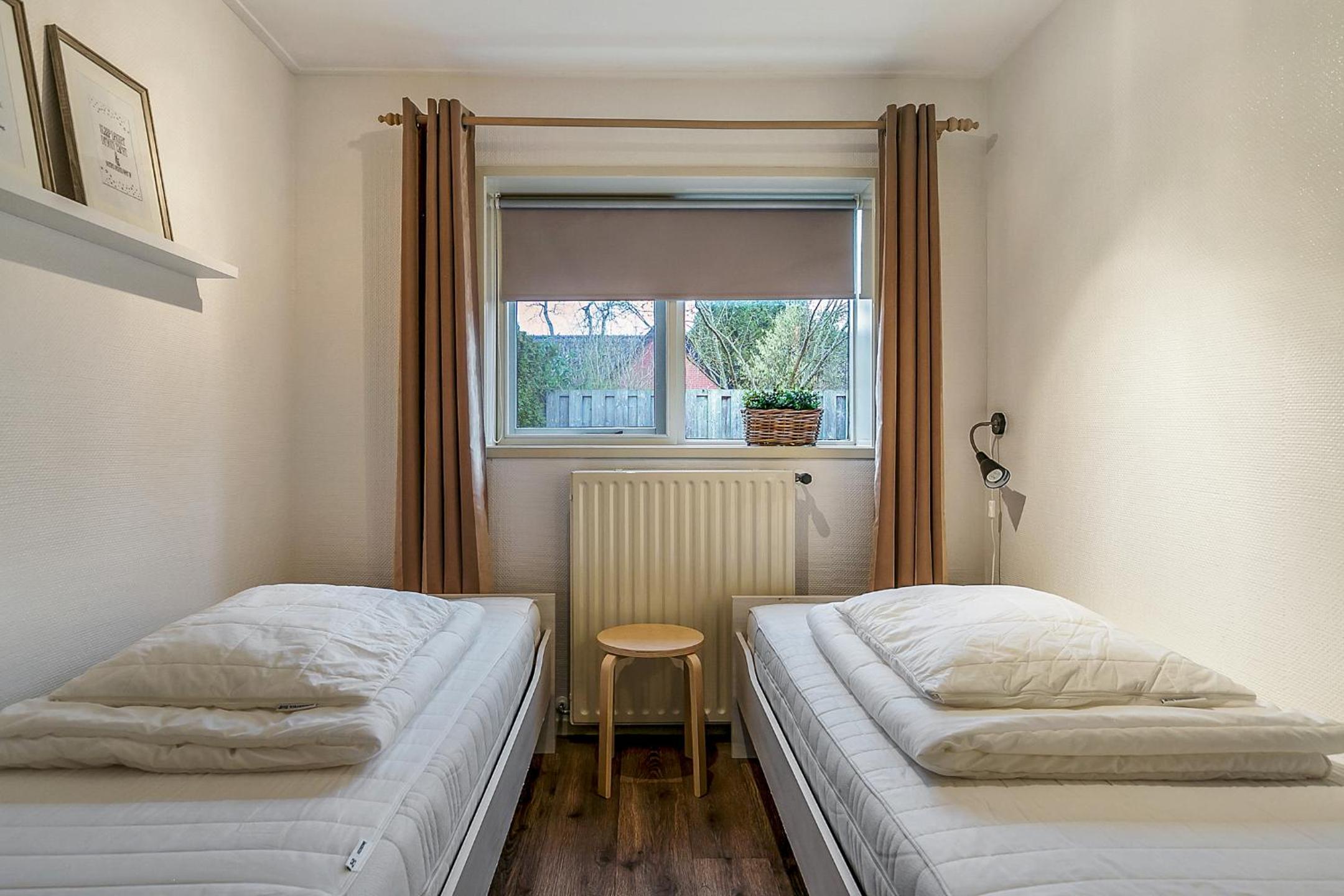 Three-Bedroom Apartment - Photo 17