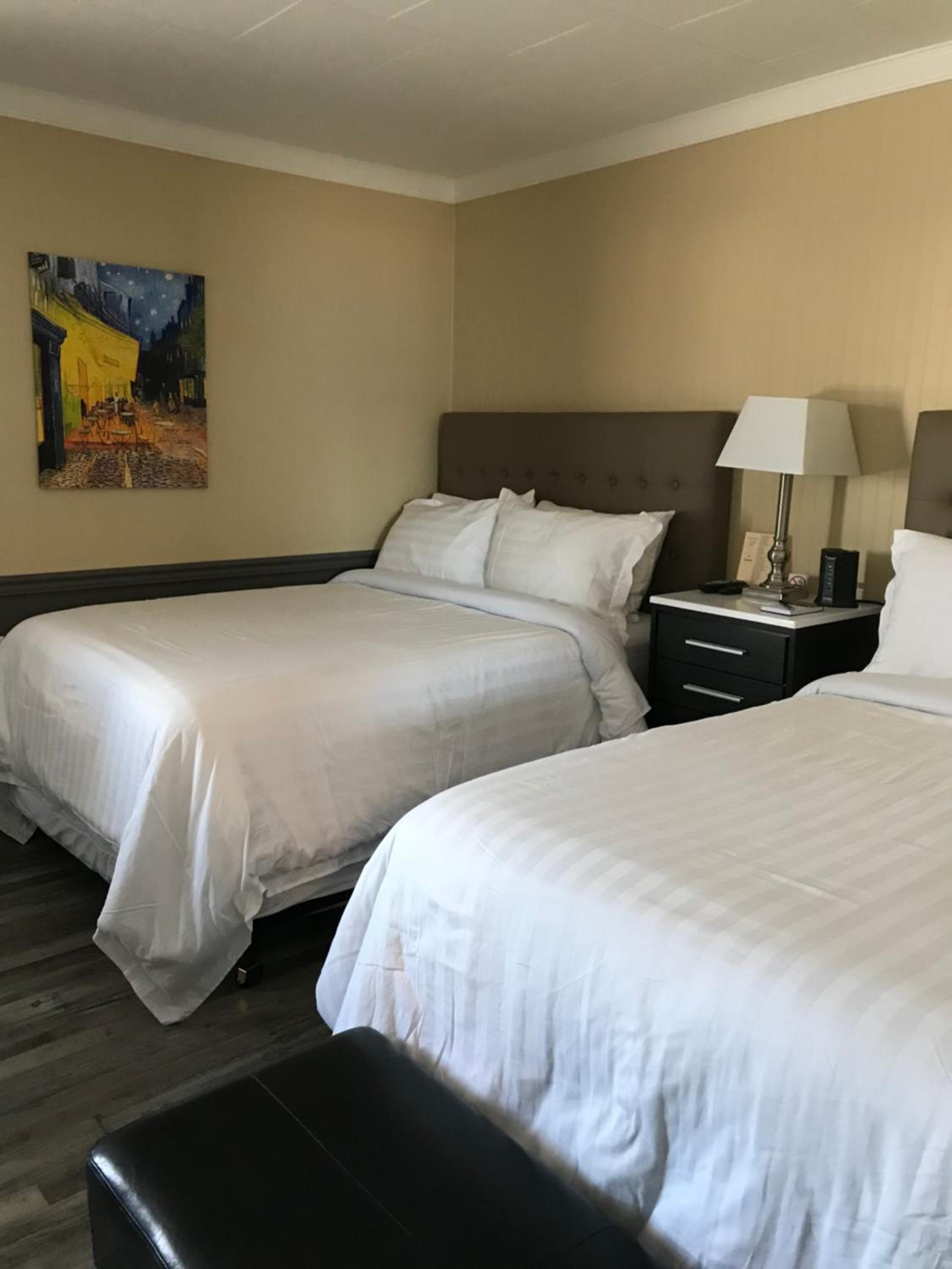 Deluxe Queen Room With Two Queen Beds photo 1