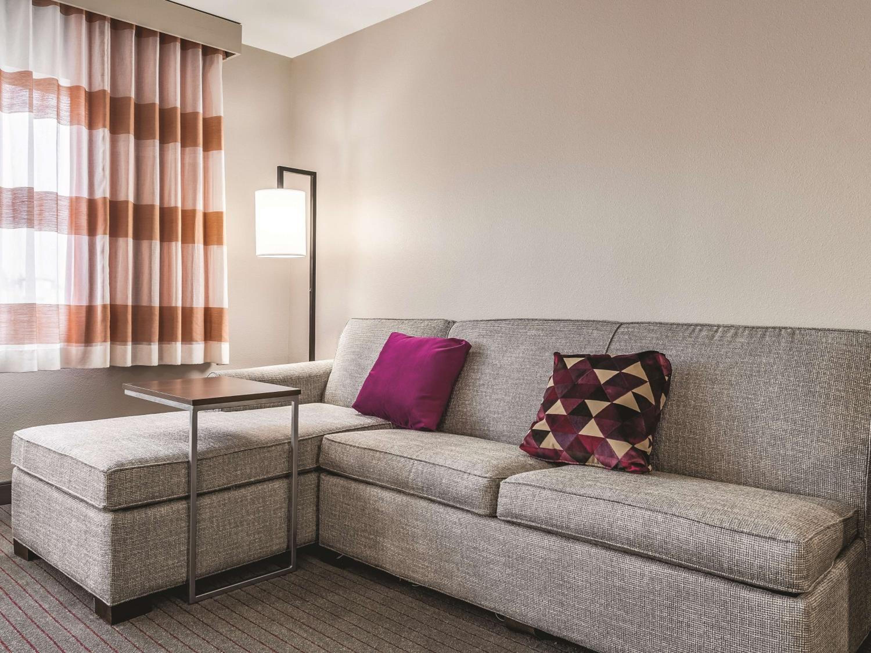 Executive Queen Room with Two Queen Beds and Sofa Bed - Photo 1
