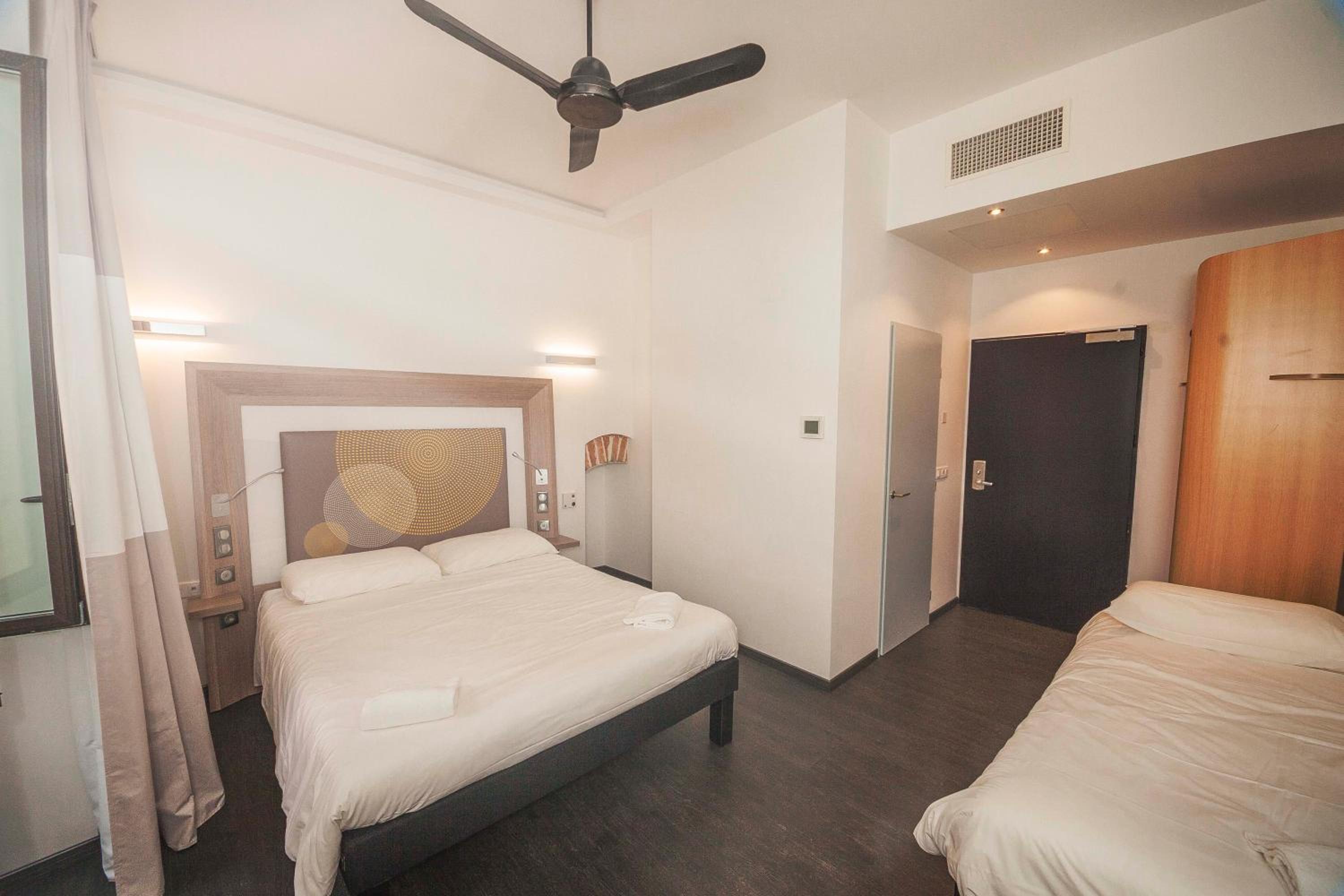 Triple Room (1 Double Bed + 1 Single Bed)