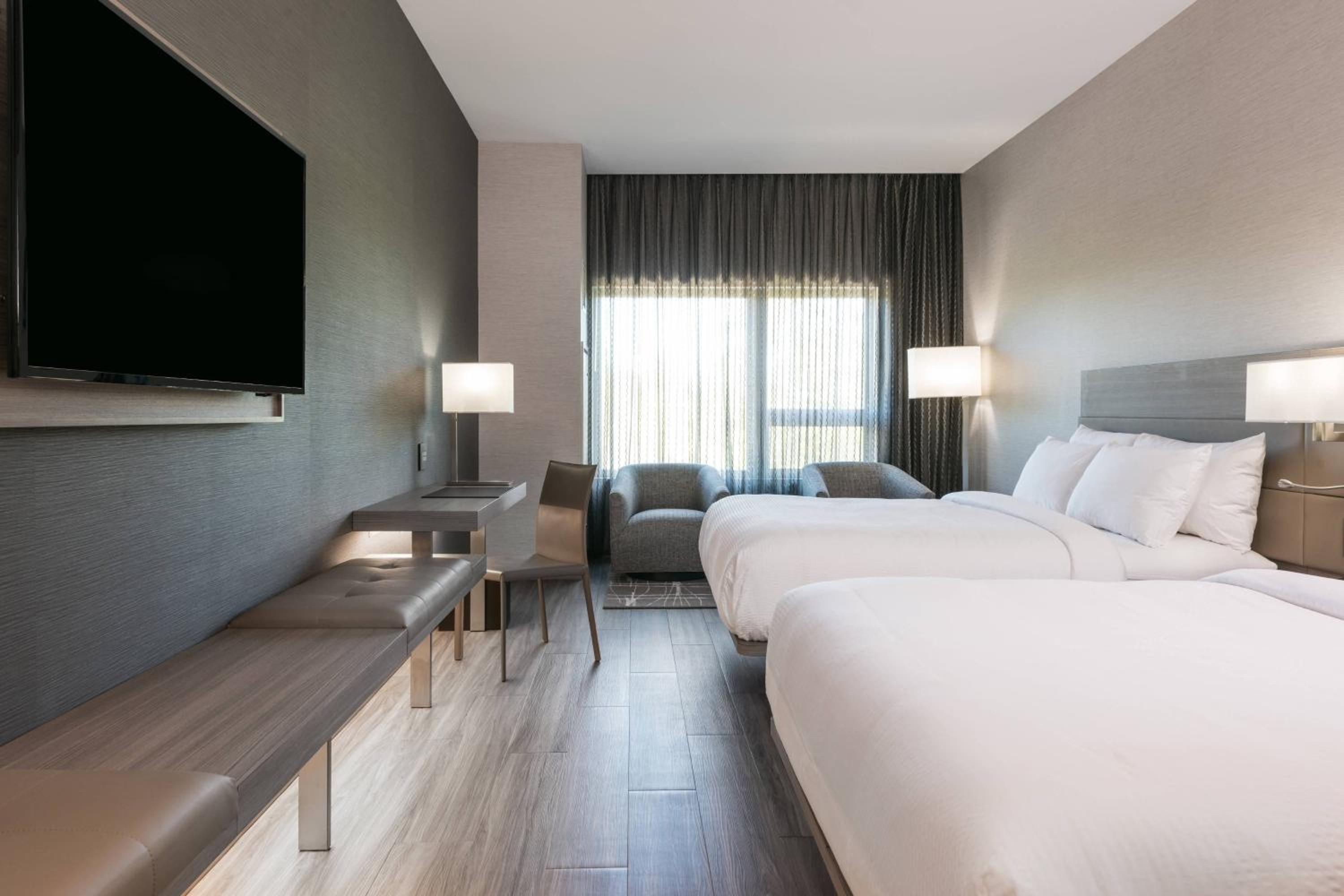 Room with One King Bed and Two Queen Beds