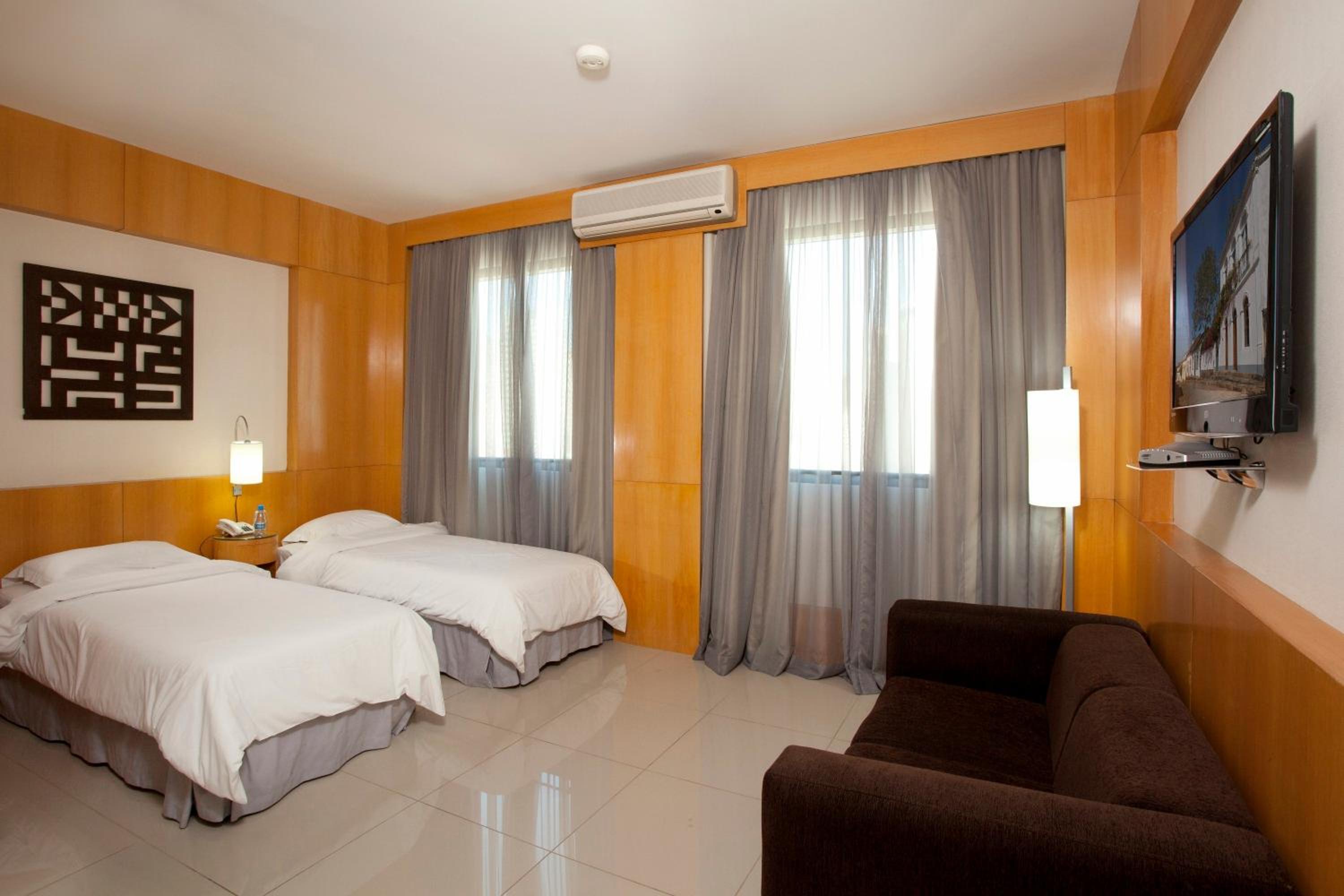 Standard Twin Room - Photo 1