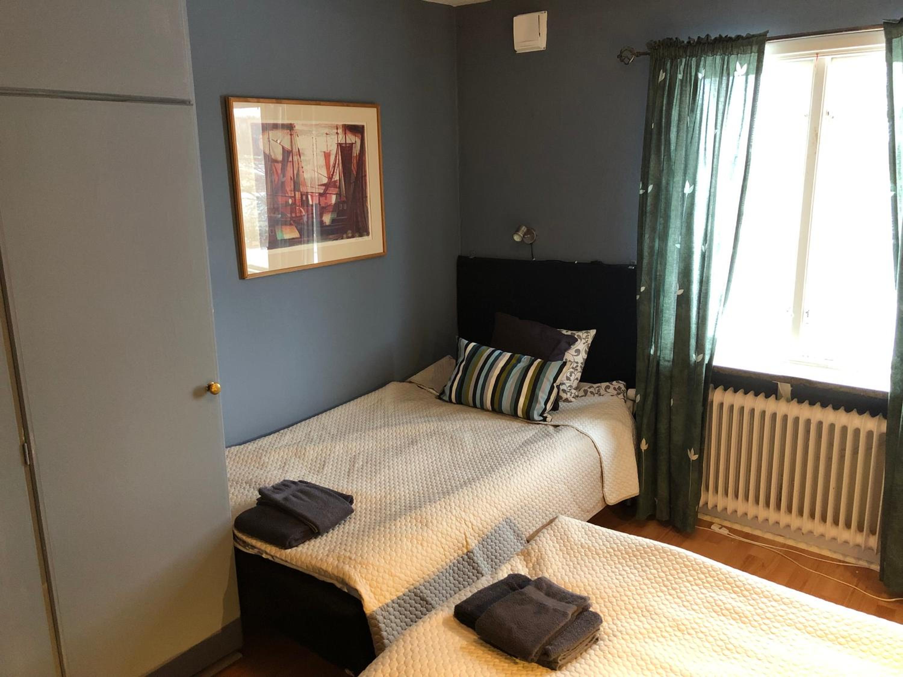 Economy Triple Room with Shared Bathroom photo 1